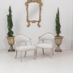 19th c. Pair of Swedish Gustavian Painted Barrel Back Armchairs with Lion Heads