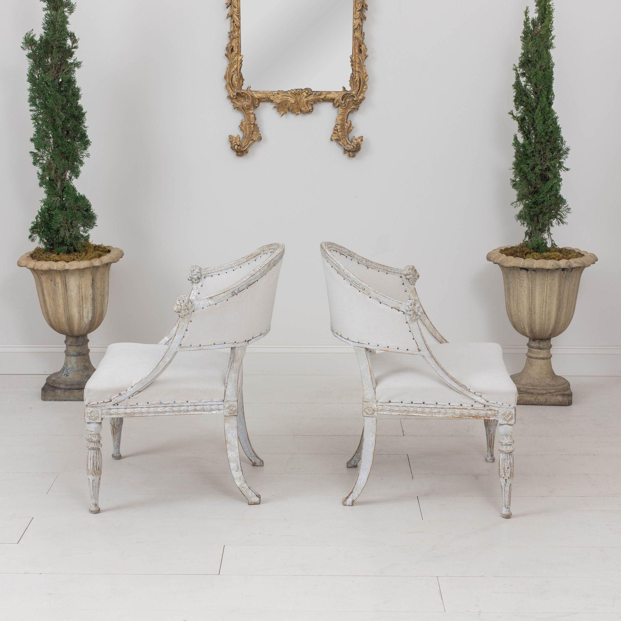 Hand-Carved 19th c. Pair of Swedish Gustavian Painted Barrel Back Armchairs with Lion Heads For Sale