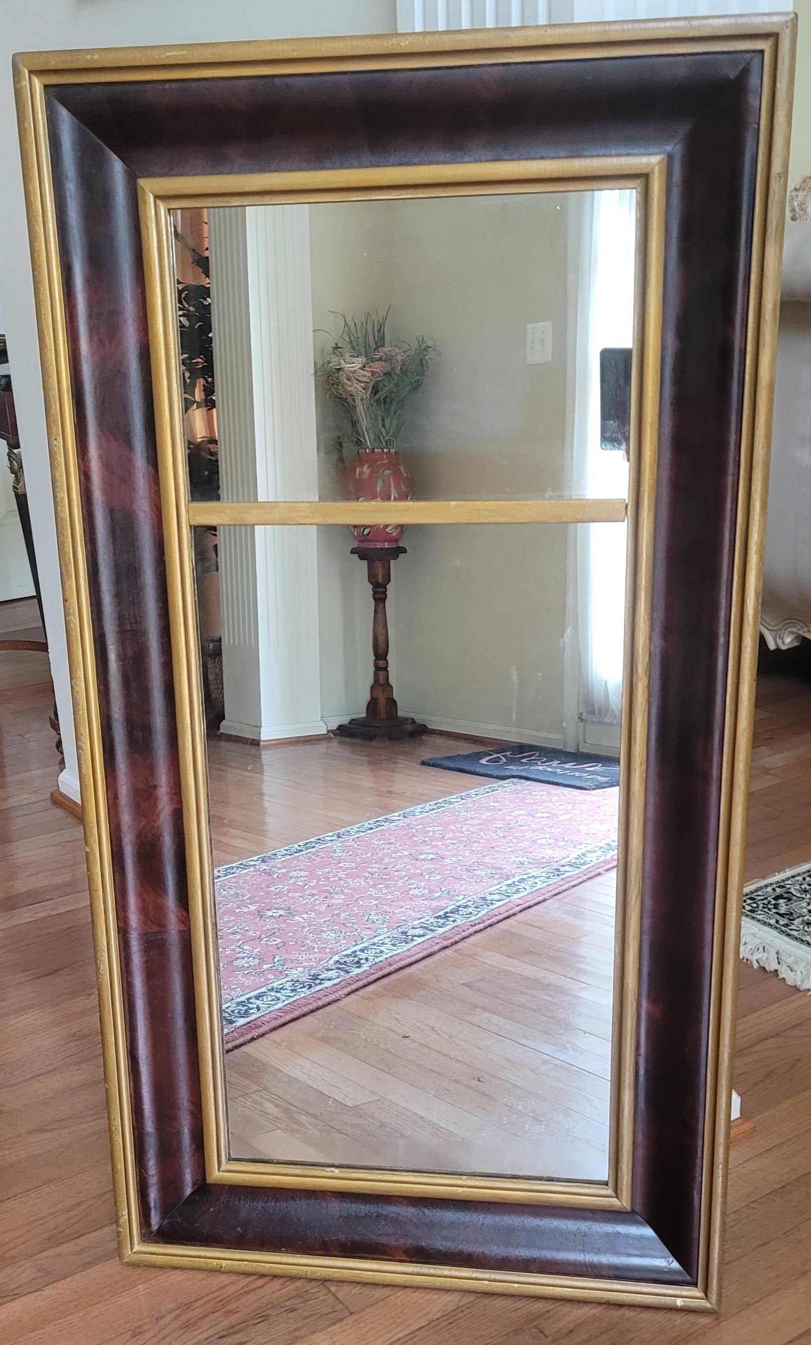 Charming mid-19th century Antique flame mahogany and giltwood American Empire Trumeau wall mirror in good antique condition.
Measures 24.75