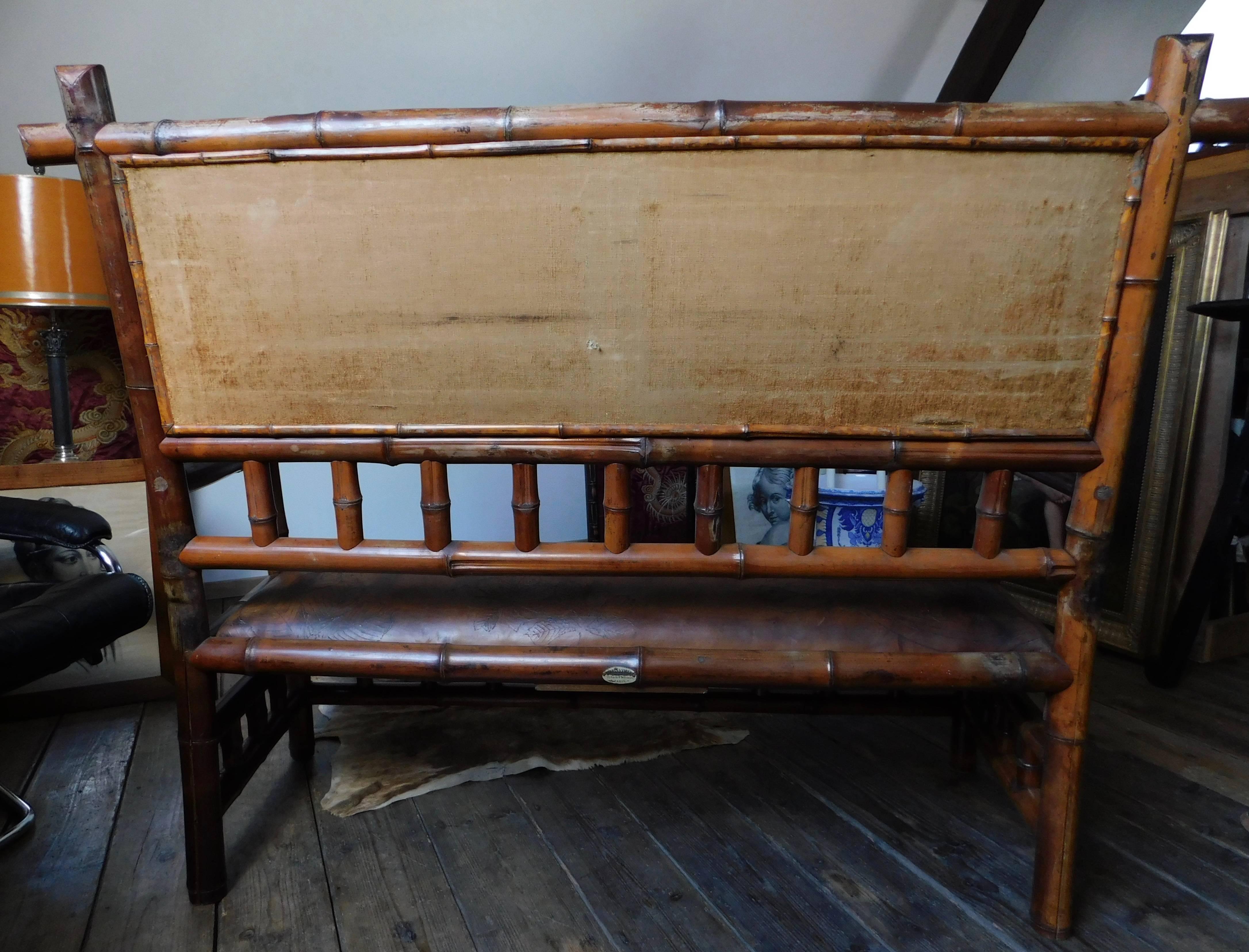 French 19th Century Perret Vibert Bamboo Settee with Decorated Leather Upholstery For Sale