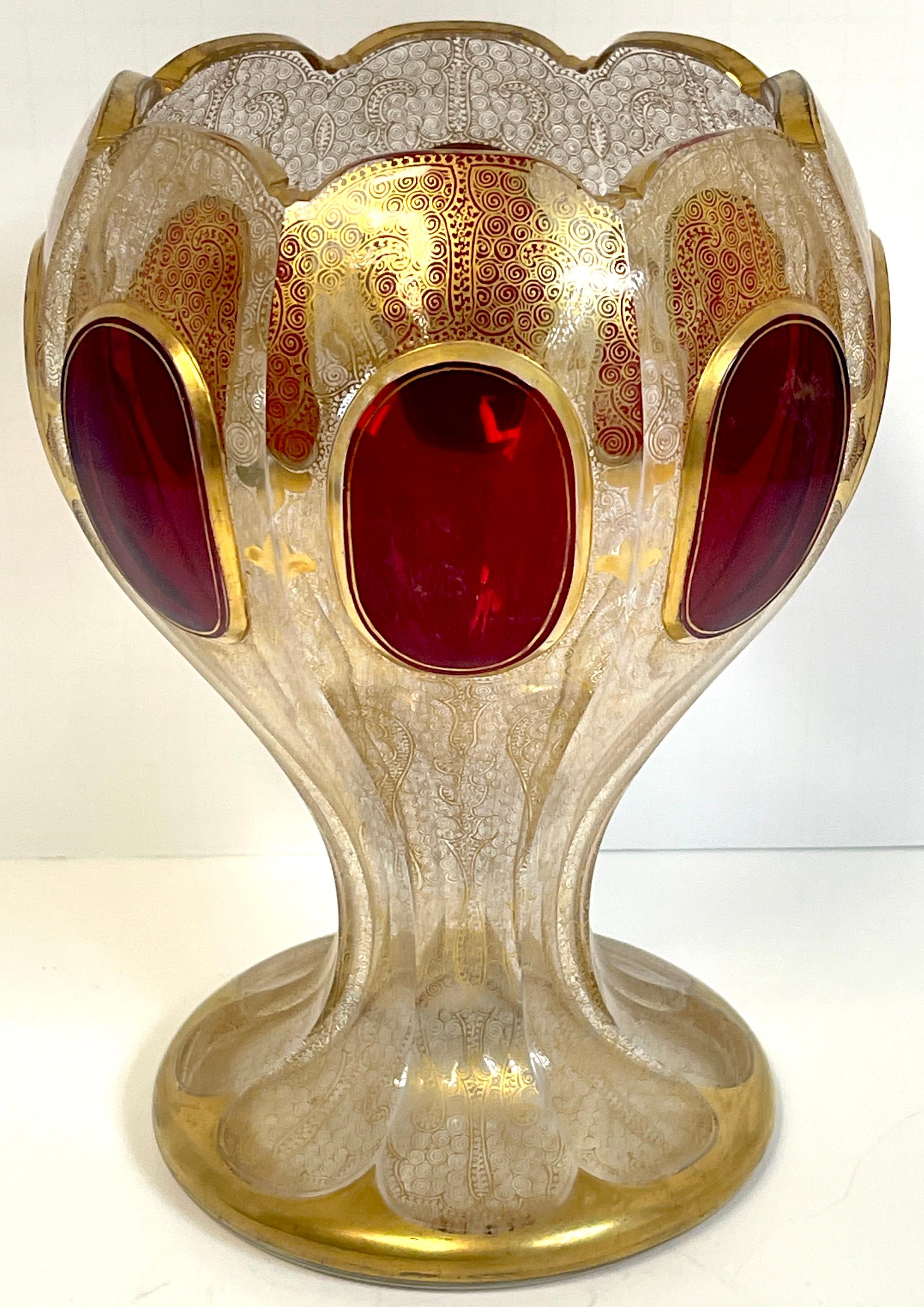 19th C. Persian style gilt enamel & ruby jeweled vase, signed 
Extraordinary gilt enamel vase with eight thick ruby jewels, Signed with an unidentified cypher, Moser/ Lobmeyr School. 



