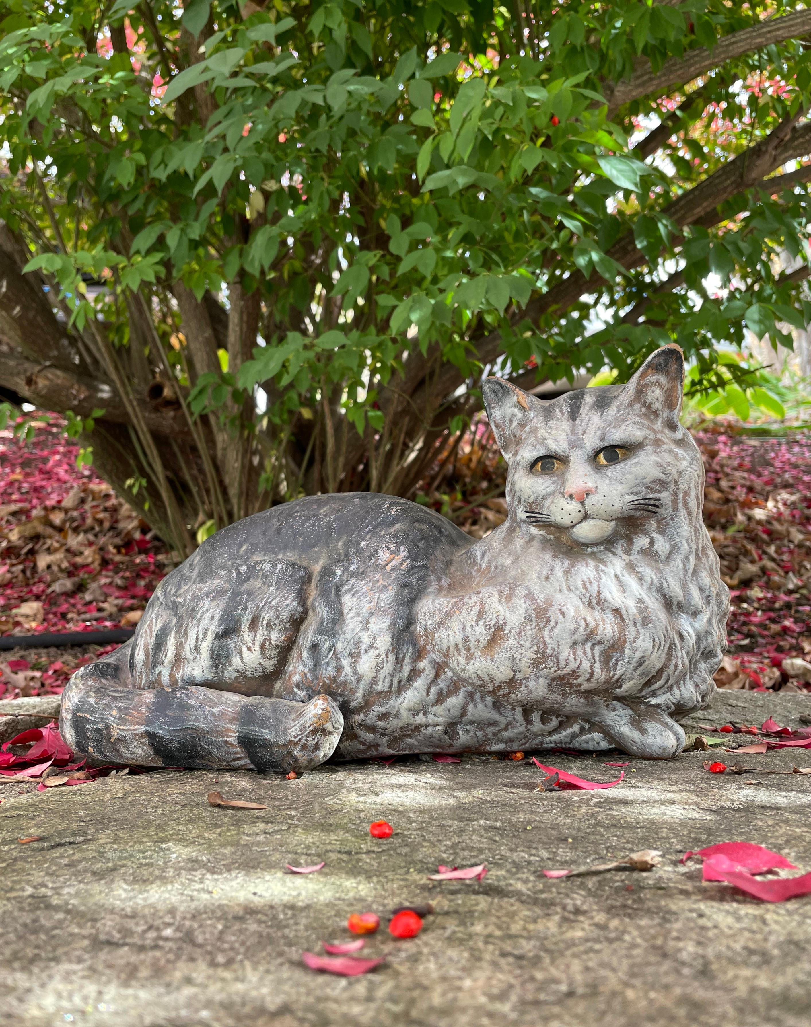 We absolutely adore this incredibly life-like three-dimensional and very detailed majolica terracotta cat, hand-painted in shades of grey and black. Her eyes, nose and whiskers are so life-like you will think her real from a distance. In amazing