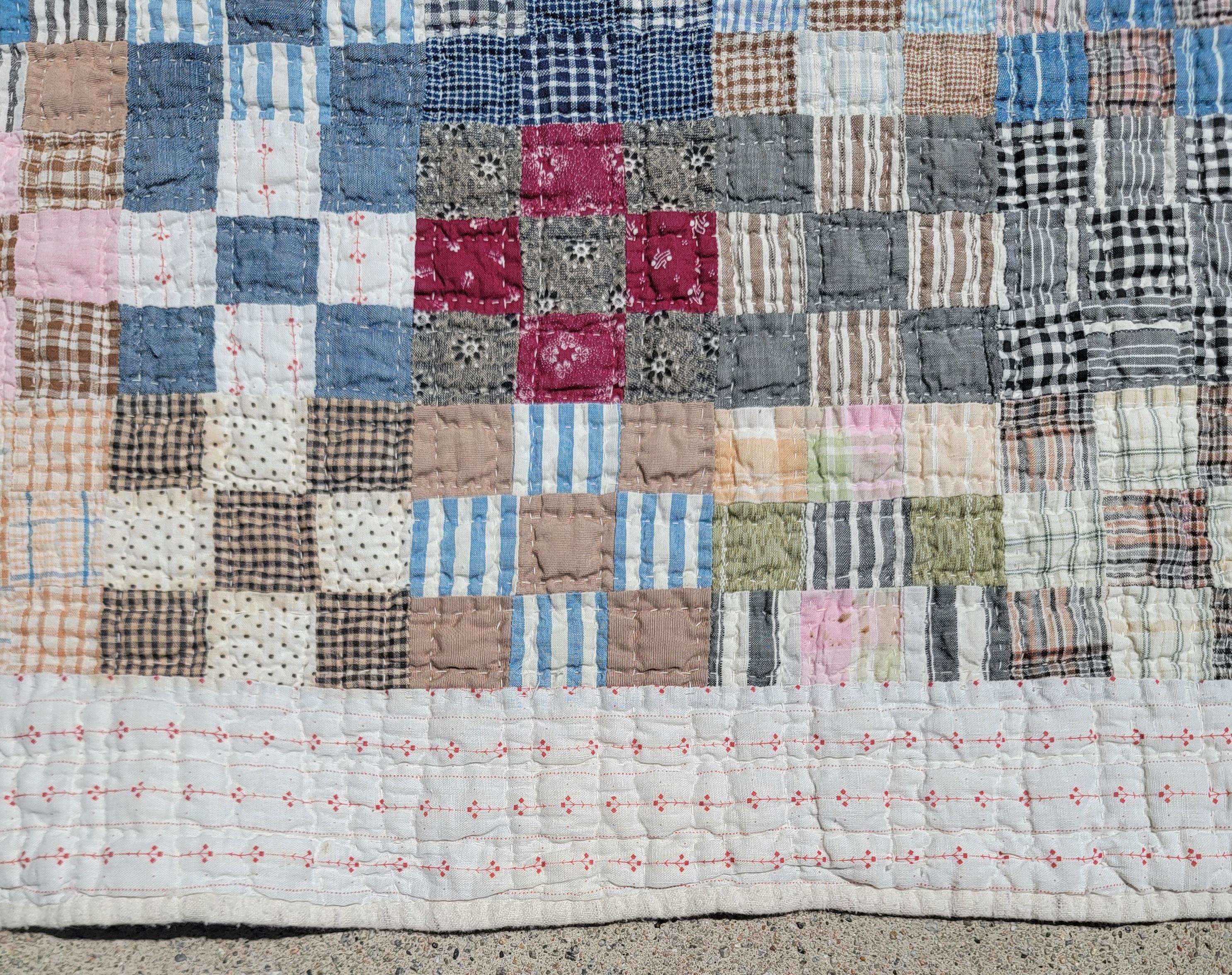 This fun country quilt is in good condition and is made up of wonderful country calico fabrics.