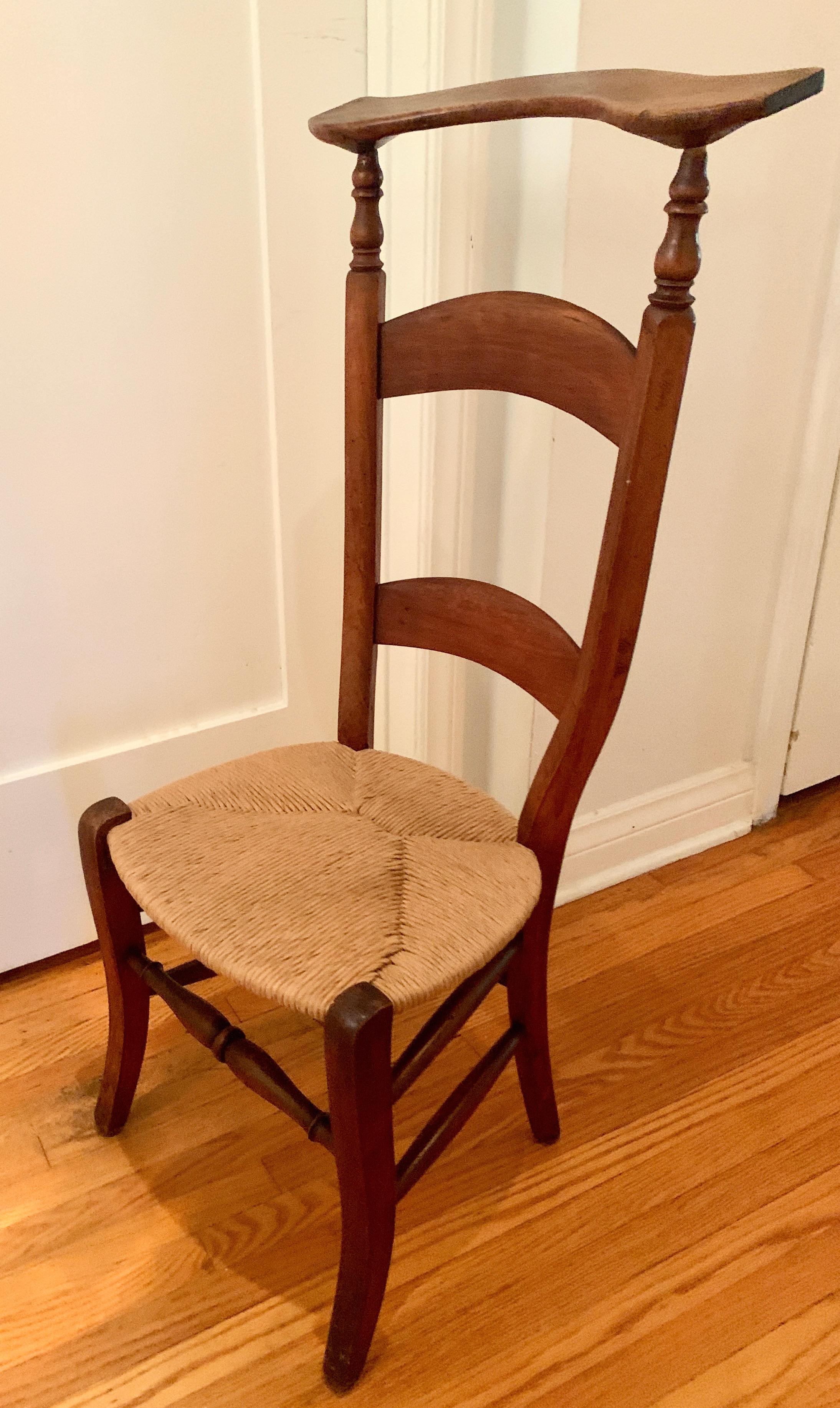 Wooden Prie Dieu Chair. A handsome piece with an origin as a prayer chair, however, in modern homes is a compliment to many spaces in the home. Useful in the dressing area or closet as a valet, or in an entry or mud room to set and put on or take