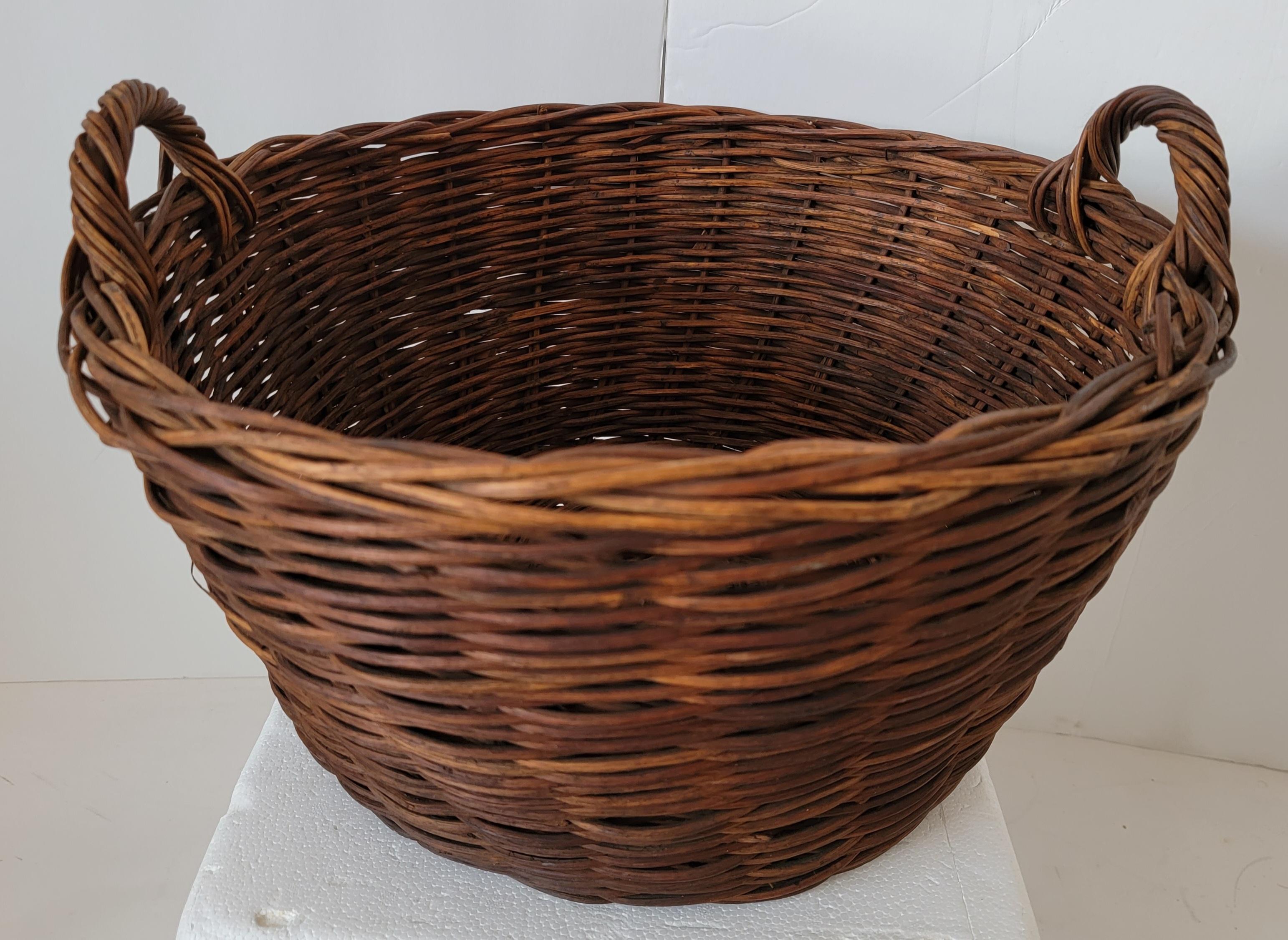 19th C Rag balls and 19th c basket with handles. From the Hess Estate Lancaster County, Pennsylvania.