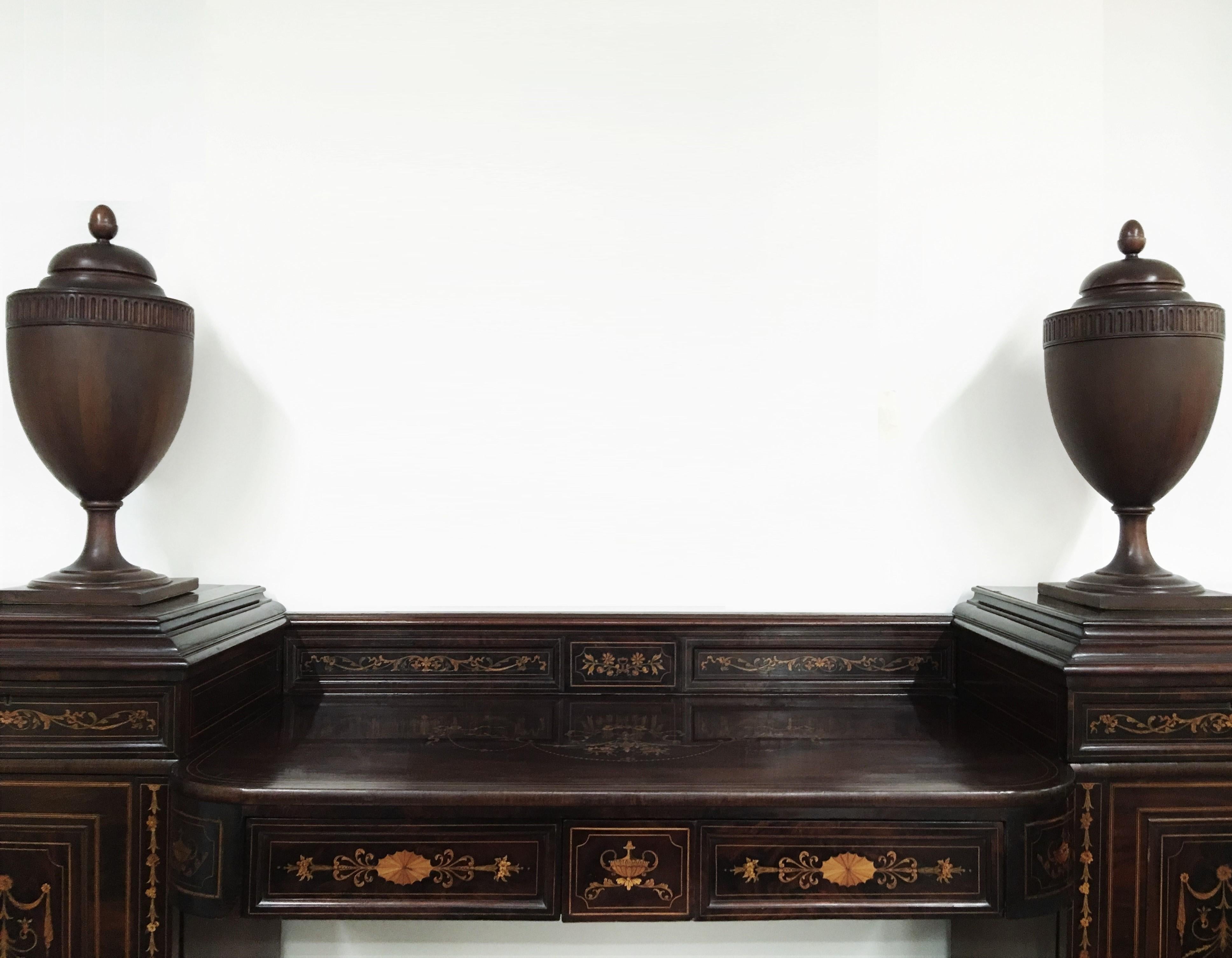 Important Regency marquetry inlaid rosewood pedestal sideboard with cutlery urns attributed to Mayhew and Ince. Decorated throughout with fine quality marquetry of pale woods inset into a contrasting rosewood ground showing floral arrangements,