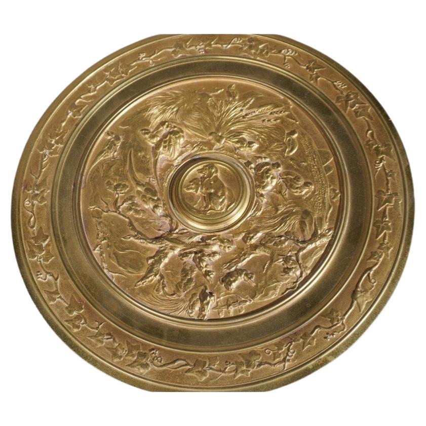 A very richly decorated 19th Century renaissance style gilt bronze and marble Tazza by French artist Louis Emile Cana.
Top dish decorated with multiple embossed wild life birds and animals around a center dog. The dish is also features embossed