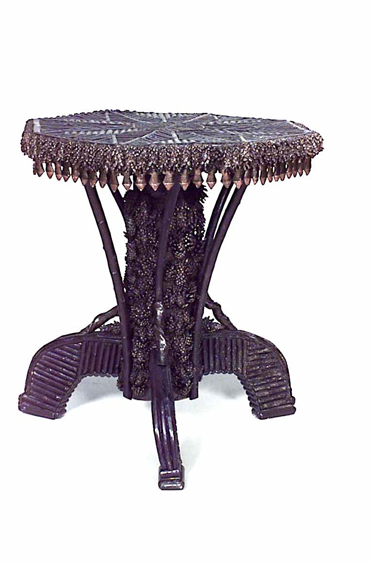 Nineteenth century rustic Continental end table with an octagonal slat twig top above a pine cone trim apron and pedestal base.