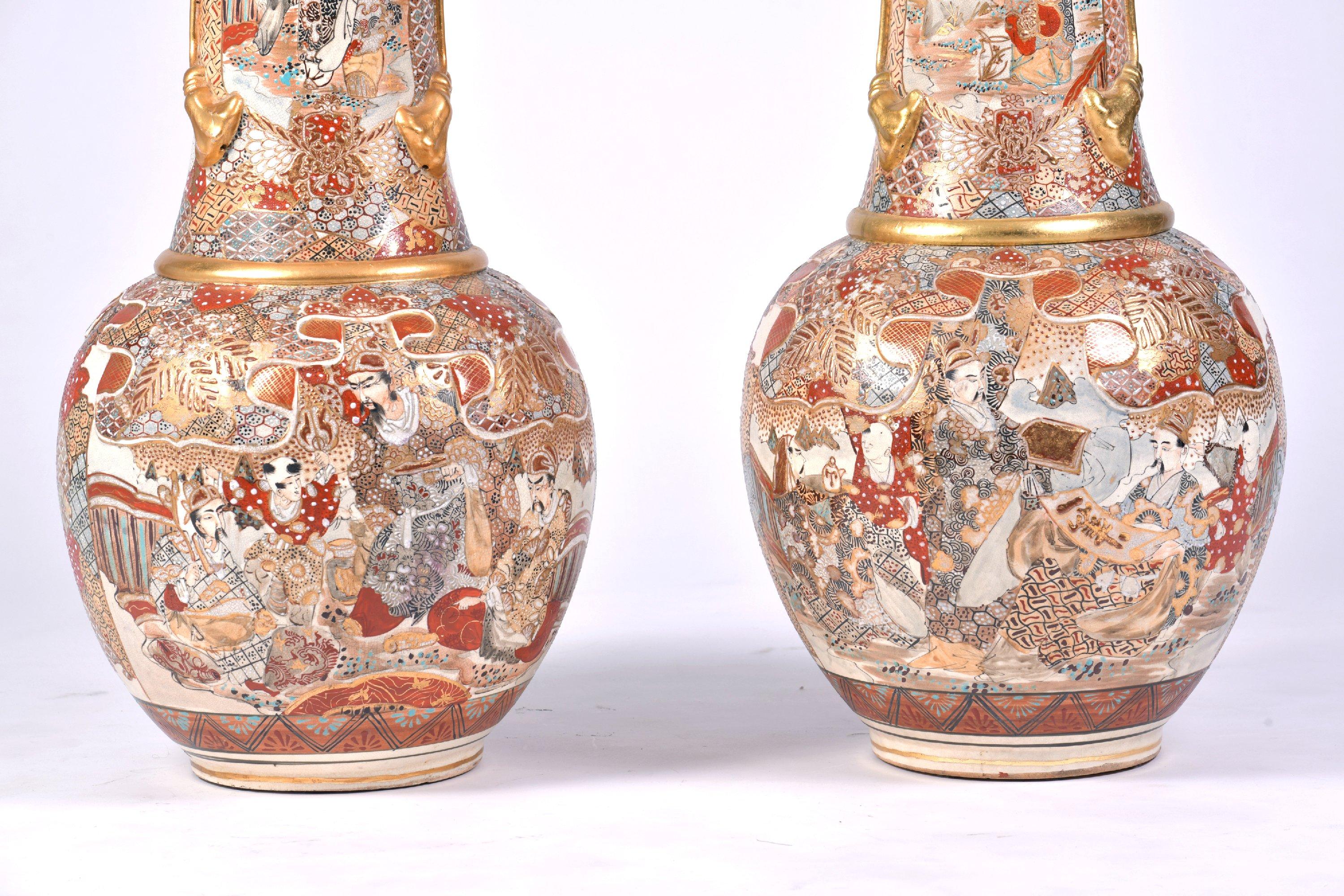 These striking and beautifully designed 19th century Japanese over-sized vases feature a profuse and intricate design pattern with gold leaf. Each vase measures 14 in-35.6 cm in diameter at the widest point of the base and 37 ½ in-95.2 cm in height.