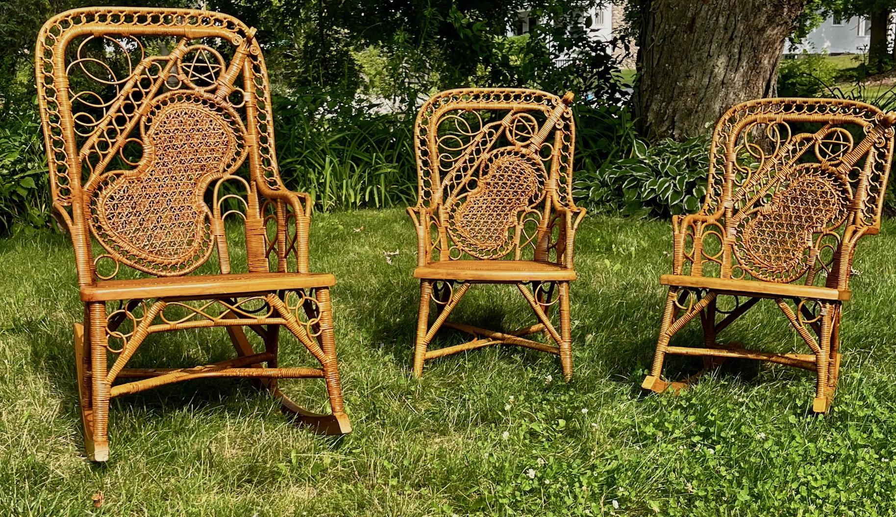 A very rare suite of three early matching wicker pieces by the Wakefield Rattan Company, Wakefield Massachusetts, C. 1890s in wonderful condition. This  matching set consists of the Mothers rocker and children's matching rocker and straight chair