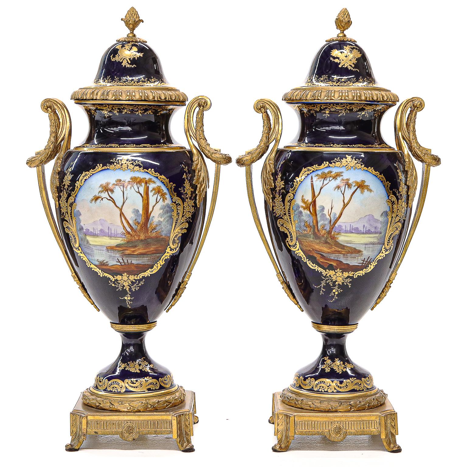 Hand-Painted 19th C. Sevres Porcelain Urns with Cobalt Blue Background For Sale