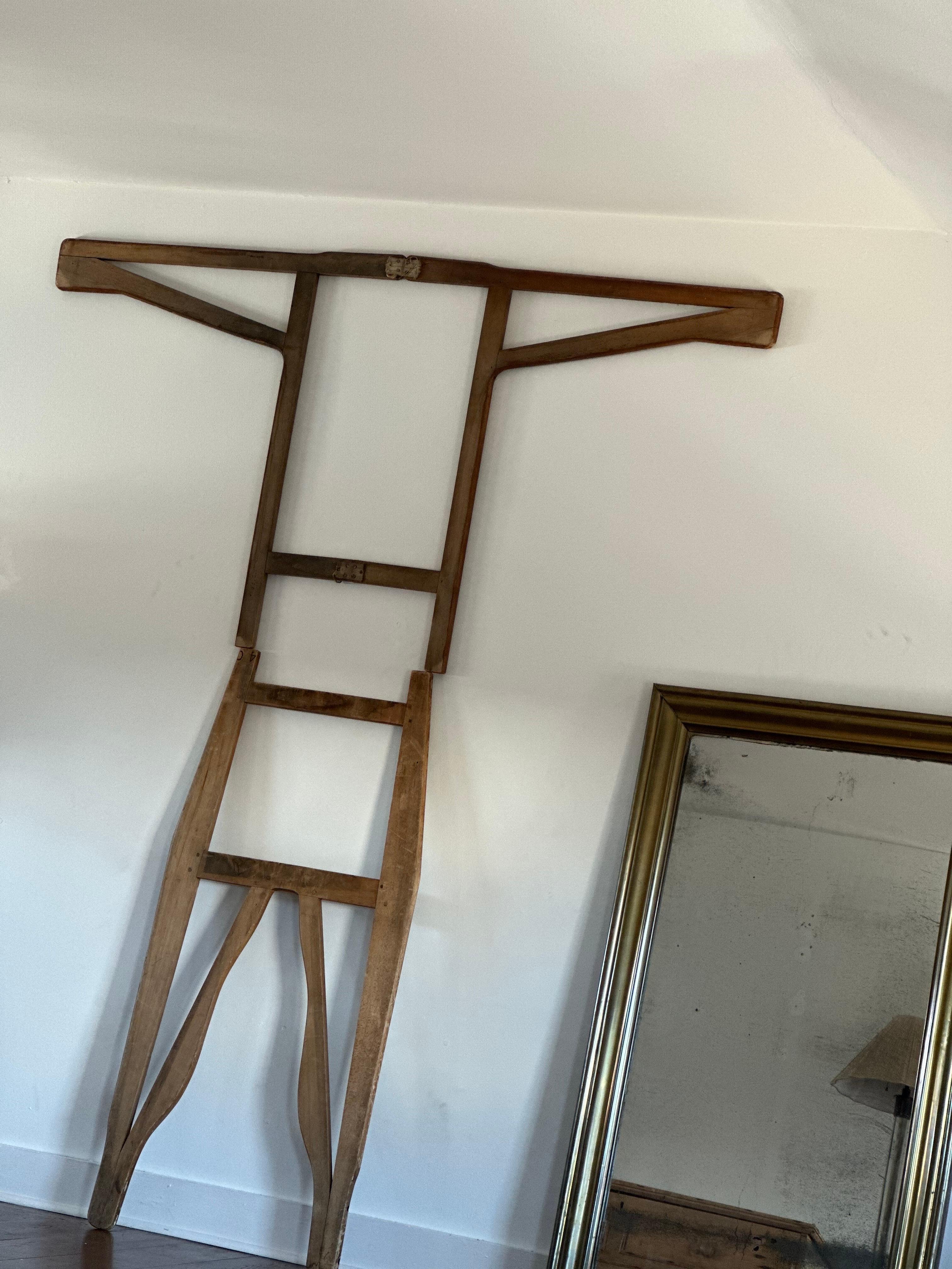 19th century shaker clothes stretcher. Massive size. Marked with a “40”
Bottoms measure H52.5” W24”
Top measures H37” W72”
The shirt is hinged in the middle with two clothe strips and folds in half. 
Amazing historical and sculptural thing. 