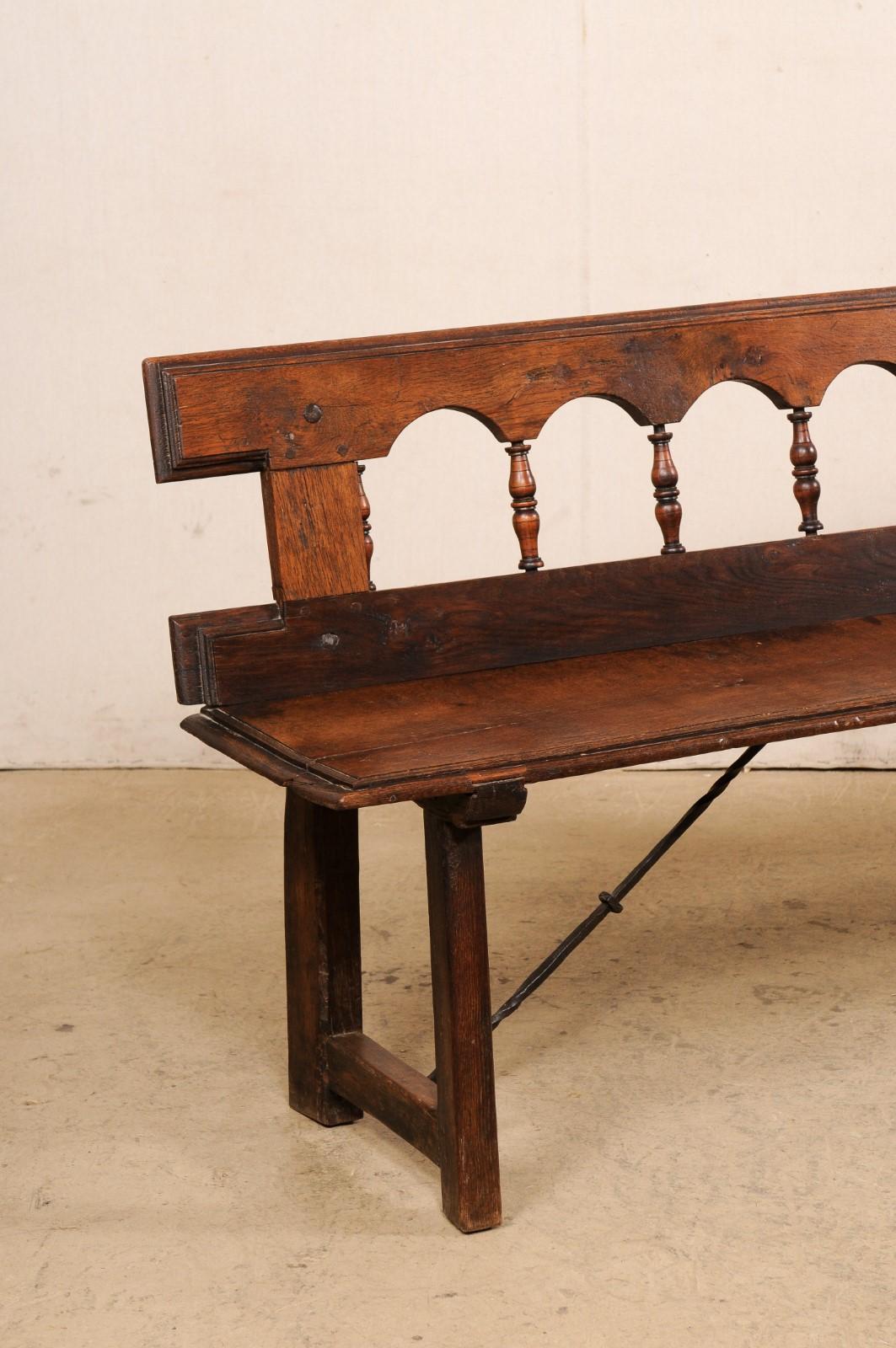 carved wood bench with back