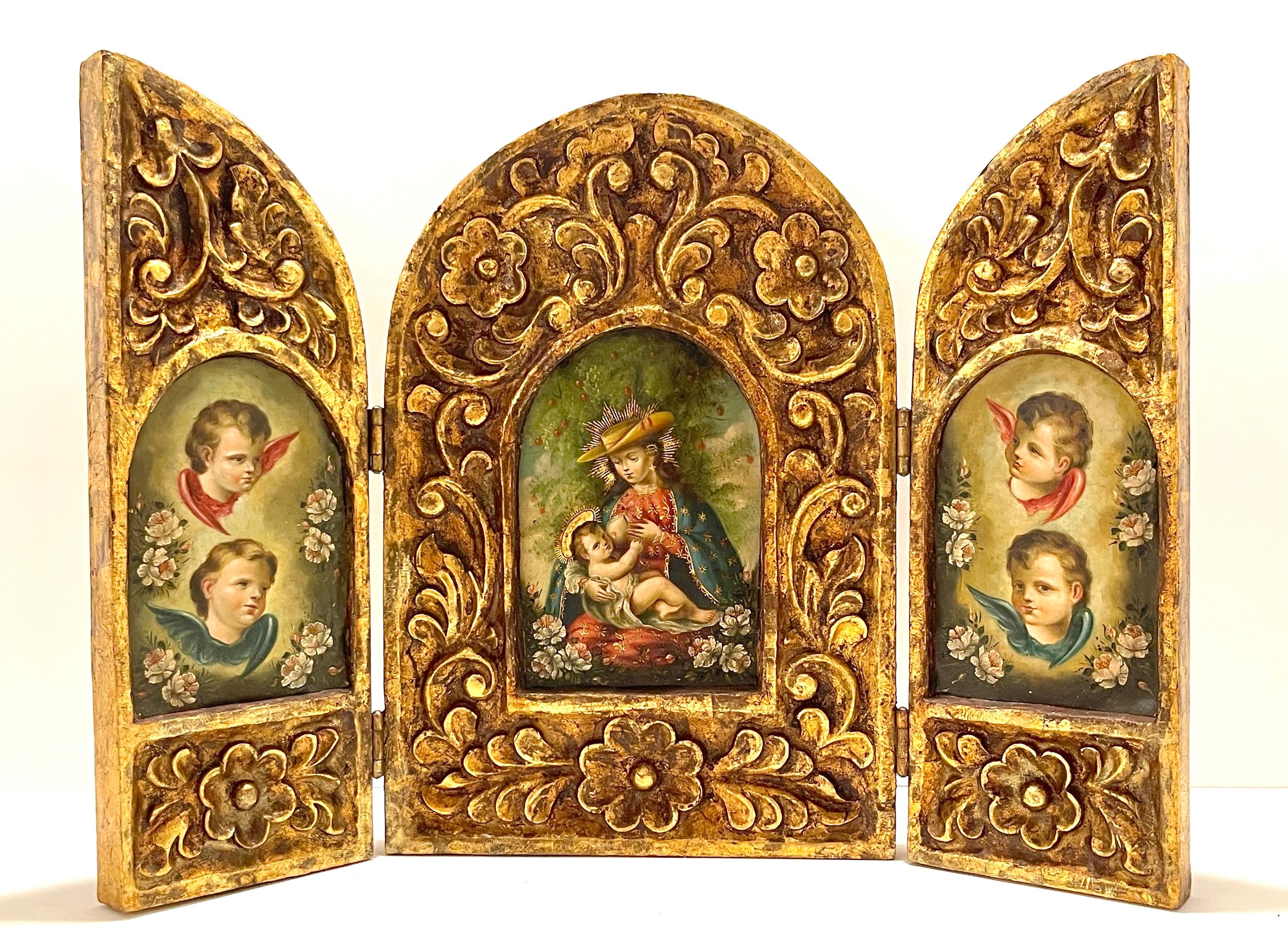 19th century Spanish Colonial carved giltwood Triptych of Virgin Mary & Christ Child
Late 19th century, South America

Of exceptional quality, the hinged three panel devotional icon. Of hand -carved giltwood with three inset oil paintings,