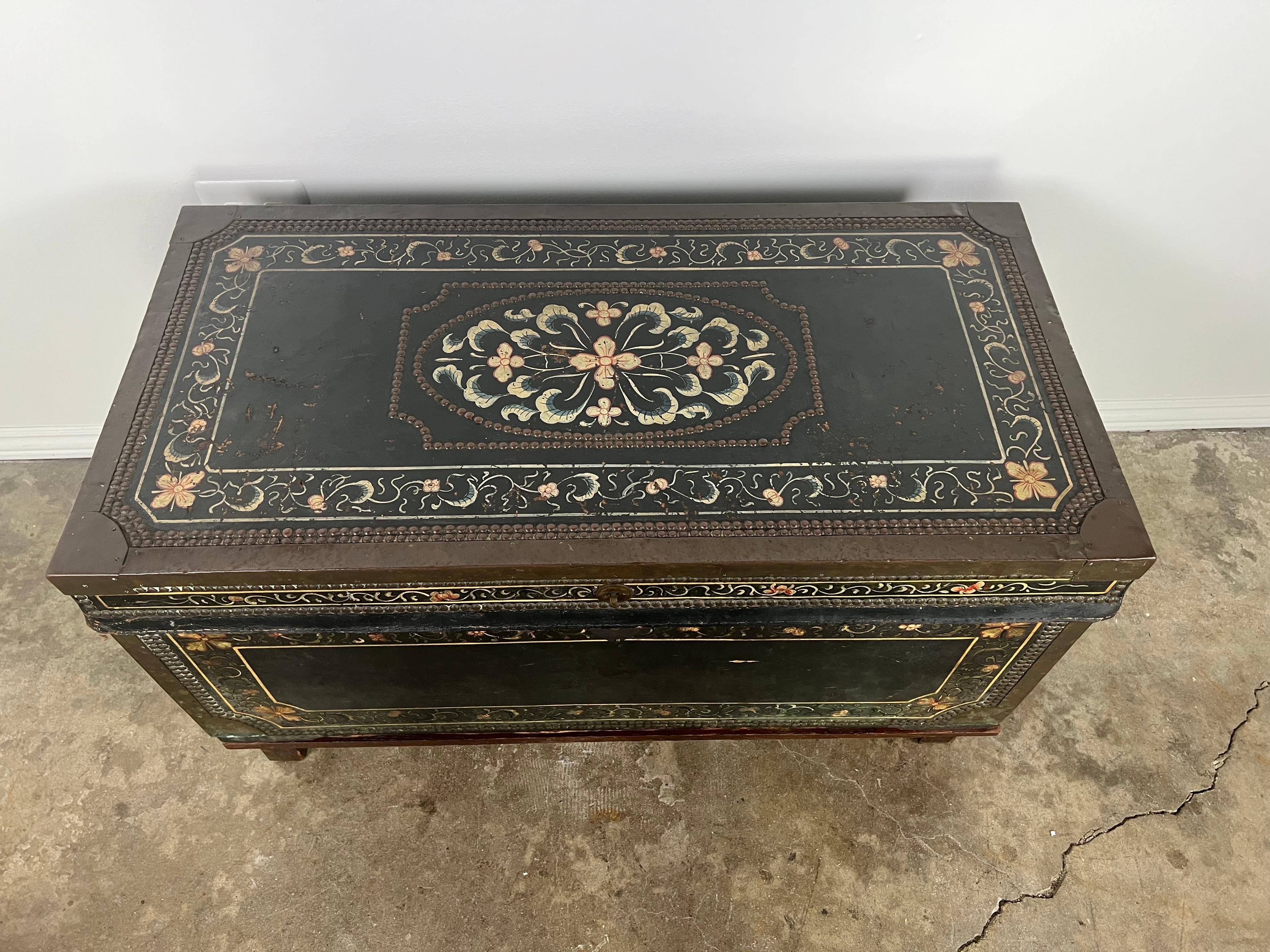 19th century Leather hand painted trunk. The paint detailing is beautifully done with rows of antique nailheads detailed throughout the trunk.