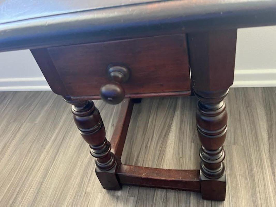 19th C Spanish style one draw side table. Walnut hand made table and Found in New Mexico. Table is in pristine condition.