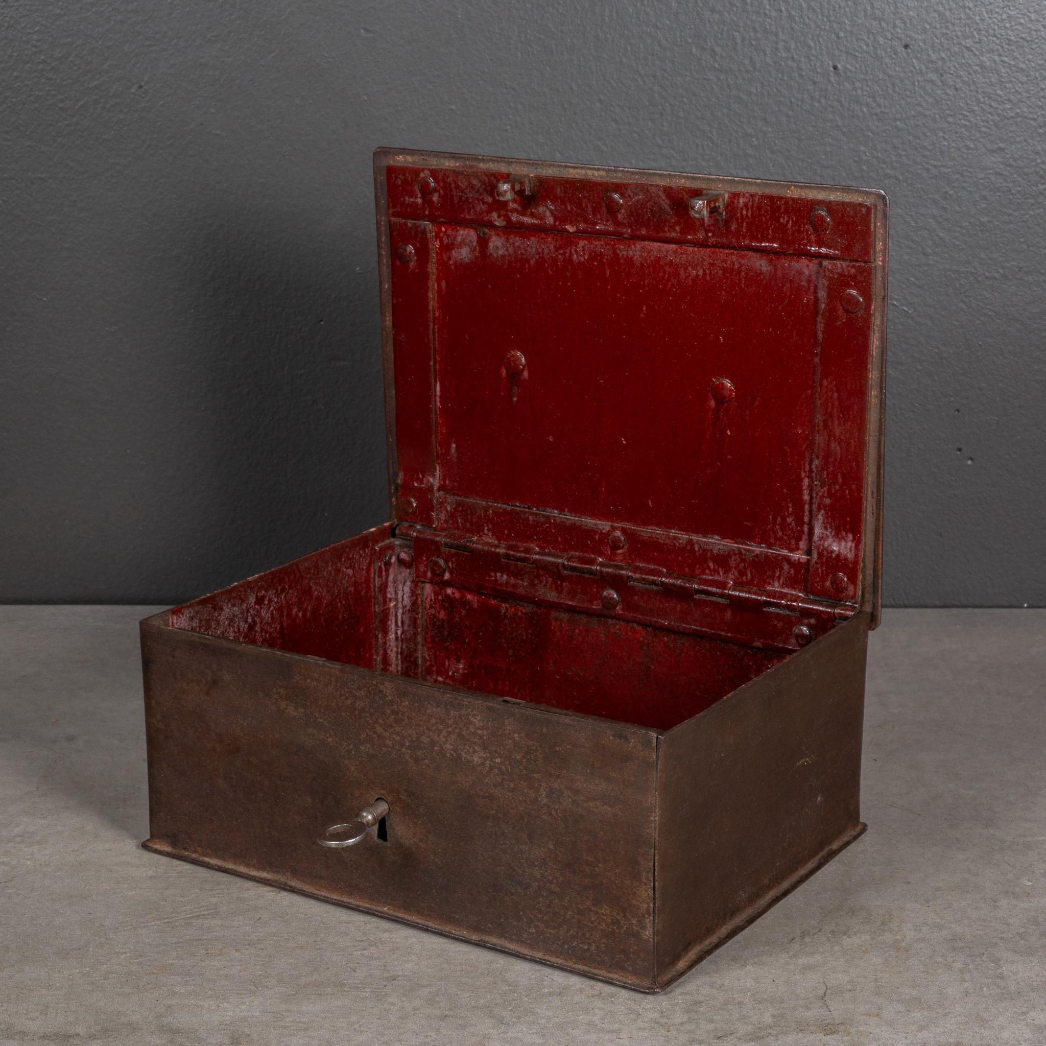 ABOUT

A 19th century metal lock box with red interior and original key. 

    CREATOR Unknown.
    DATE OF MANUFACTURE c.1800-1899. 
    MATERIALS AND TECHNIQUES Metal. 
    CONDITION Good. Wear consistent with age and use. 
    DIMENSIONS H 3.25 W