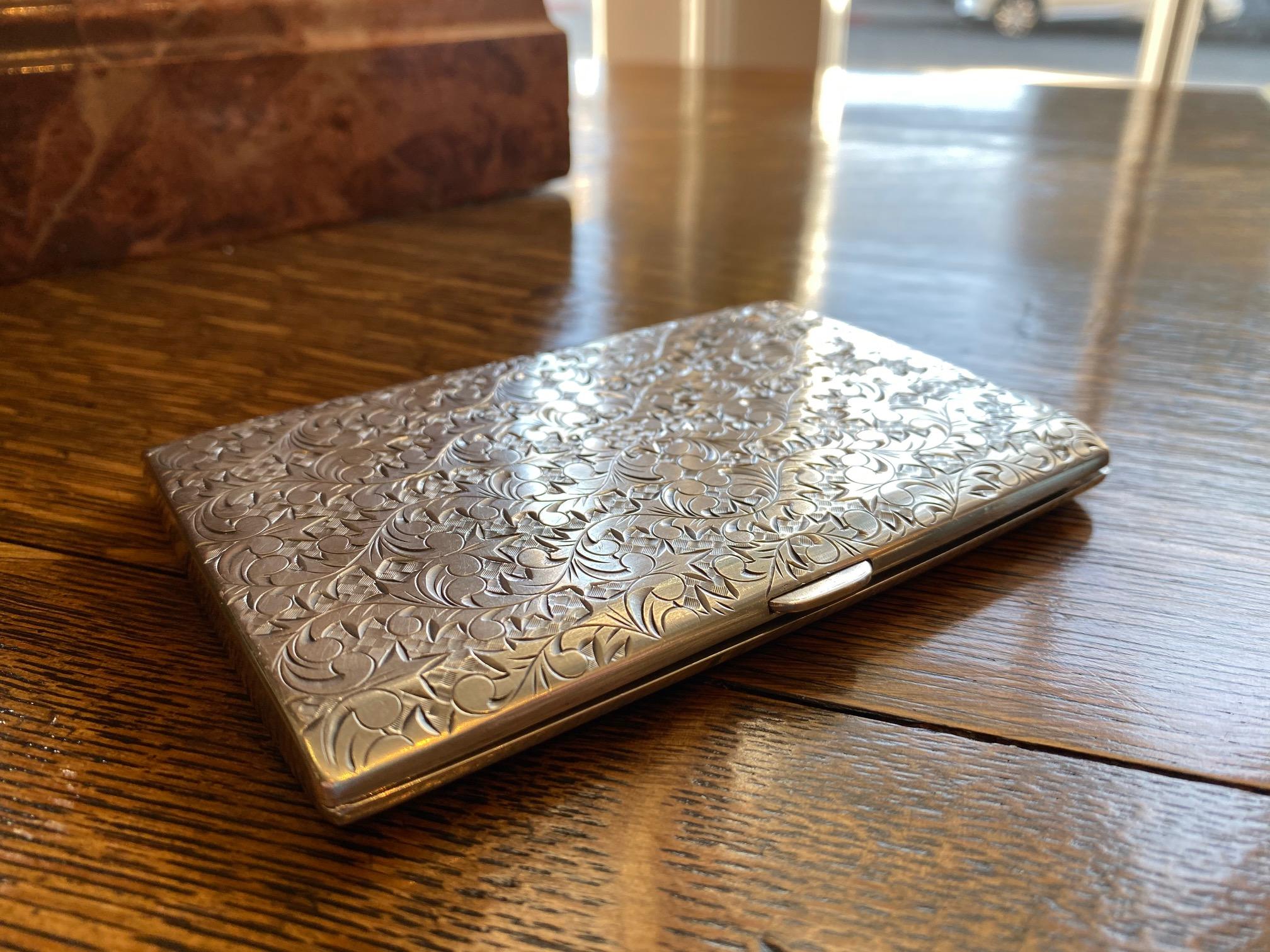 A magnificent and extremely rare sterling silver engraved cigarette case holder. Perfect gift for any collector, can be used as personal or business cards case as a special gift idea for the holiday season or as a decorative object biblot on a desk.