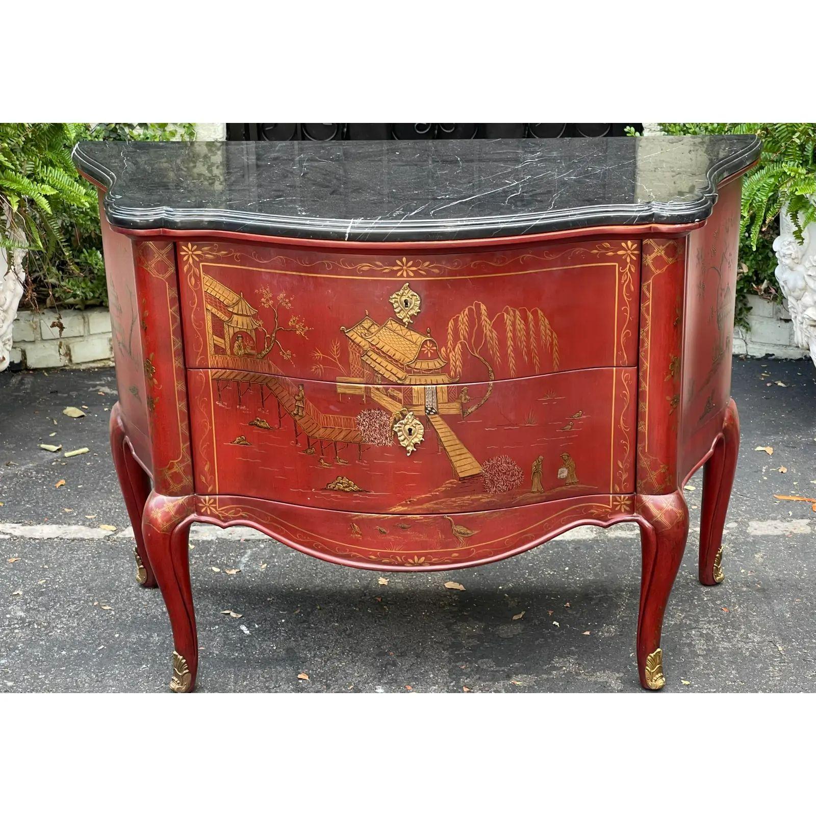 19th century Style red chinoiserie & black marble commode - The Newport Historic Mansion Collection. It features beautifully hand painted chinoiserie decoration on a red ground. It was made by E. J. Victor for the Historic Society of