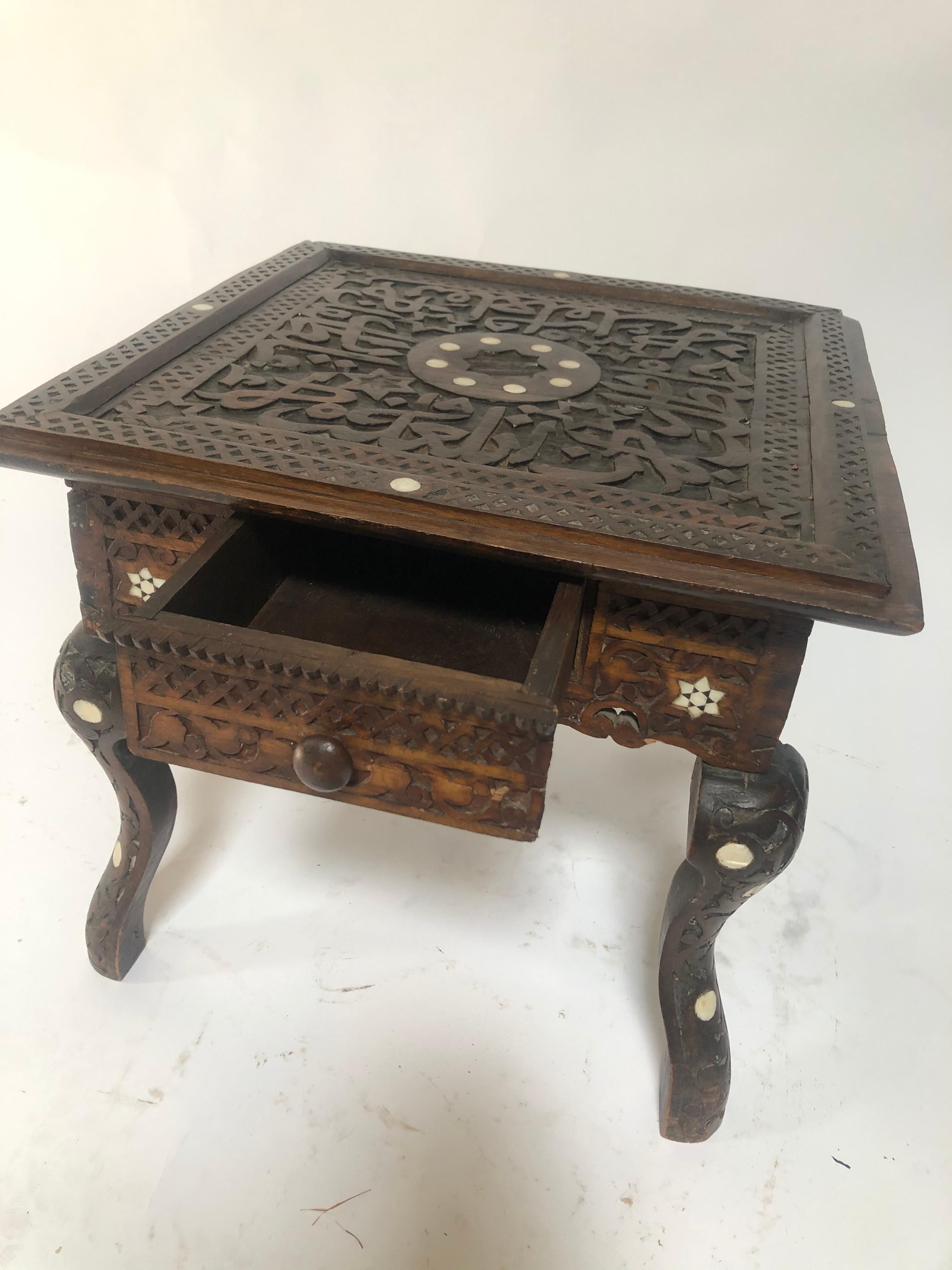 19th century Syrian inlay table with single-drawer.