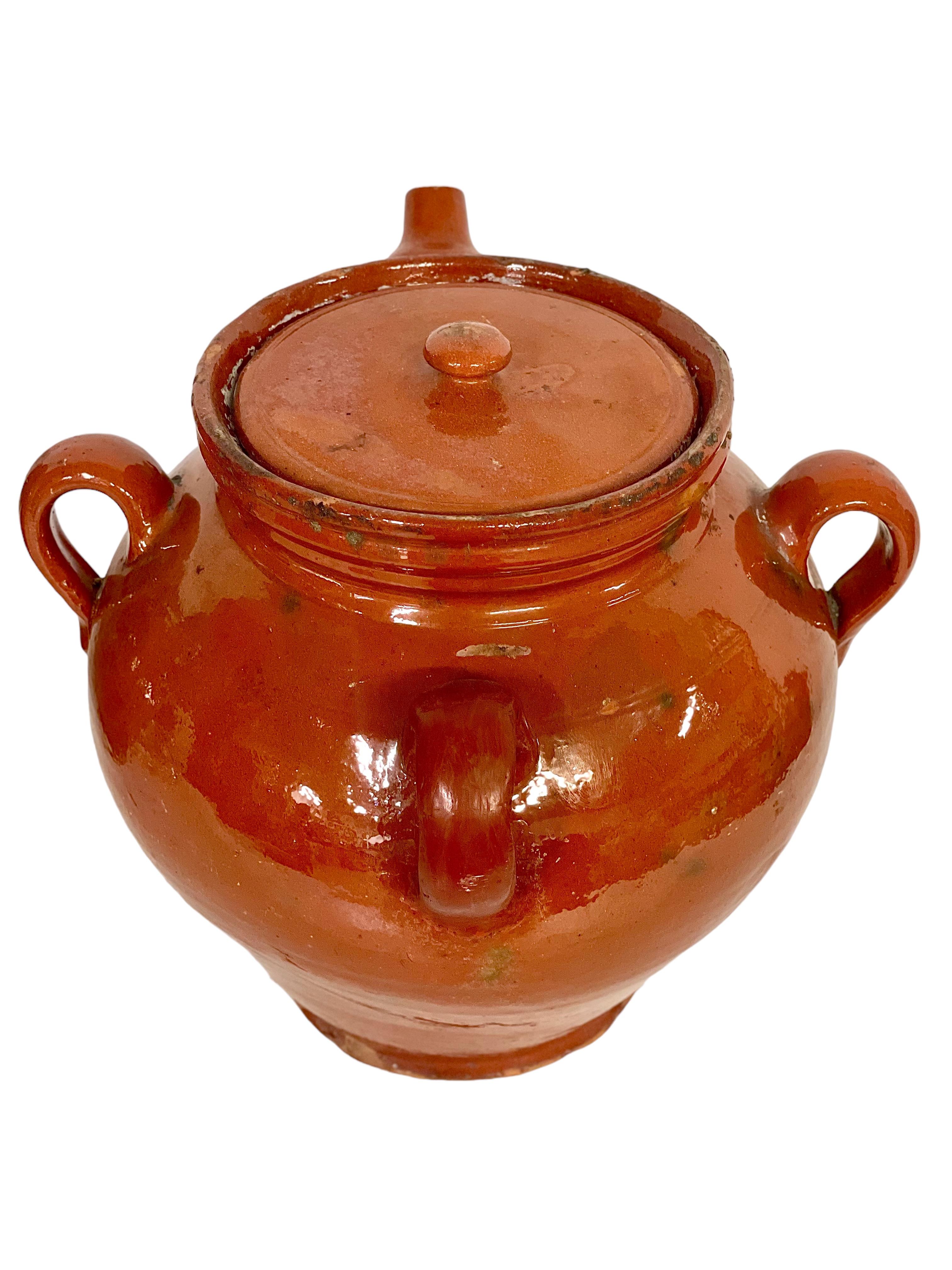 Vernissé A.I.C. Grand pot à huile en terre cuite avec son couvercle en vente
