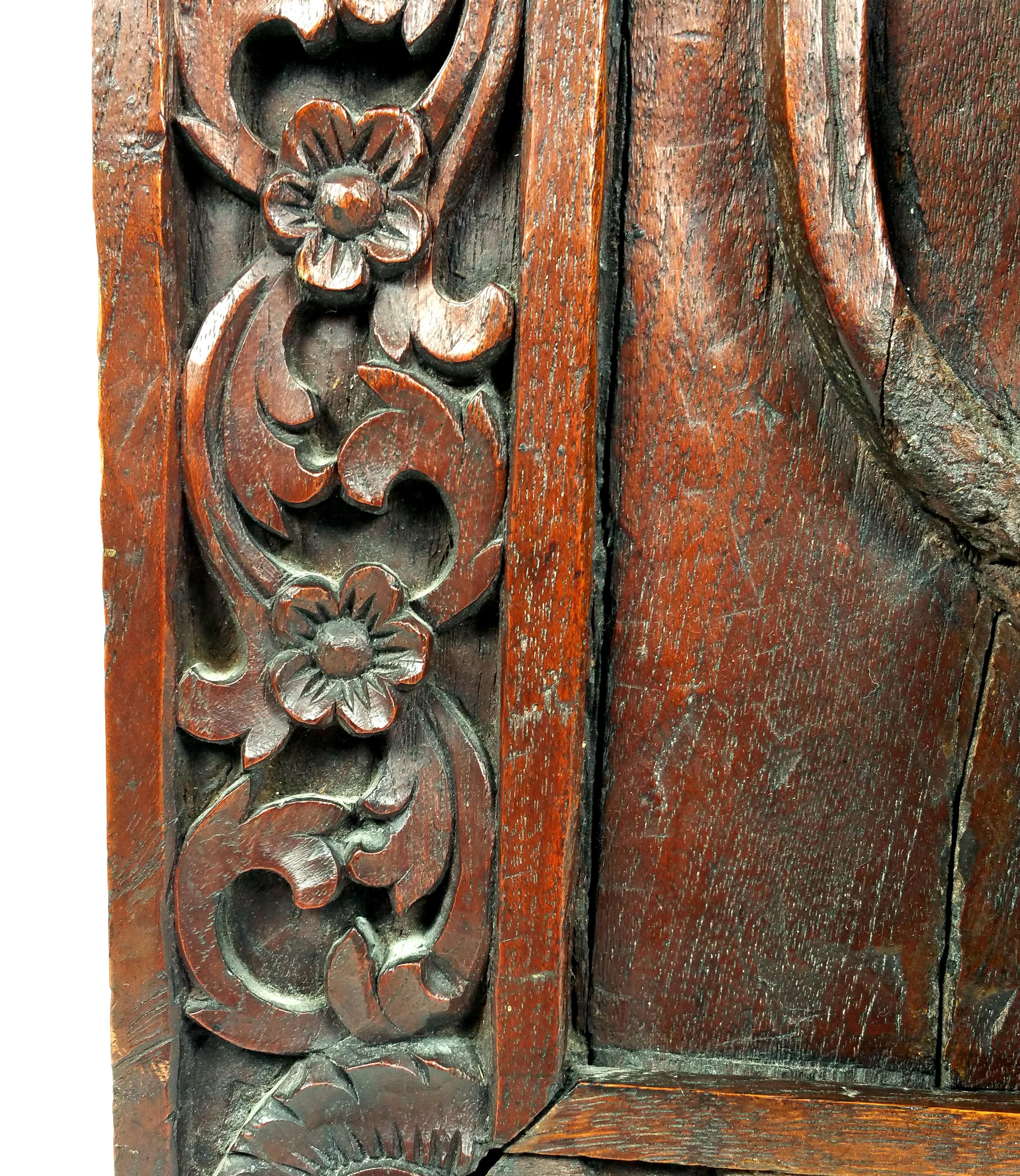 This marvellous and impressive 19th century. Tibetan carved hardwood wall panel depicts a monk holding a basket and surrounded by lotus flowers. It measures 26 in – 66 cm high by 17 ¾ - 45.1 cm wide, with a depth of 5 in – 12.7 cm. This unique and
