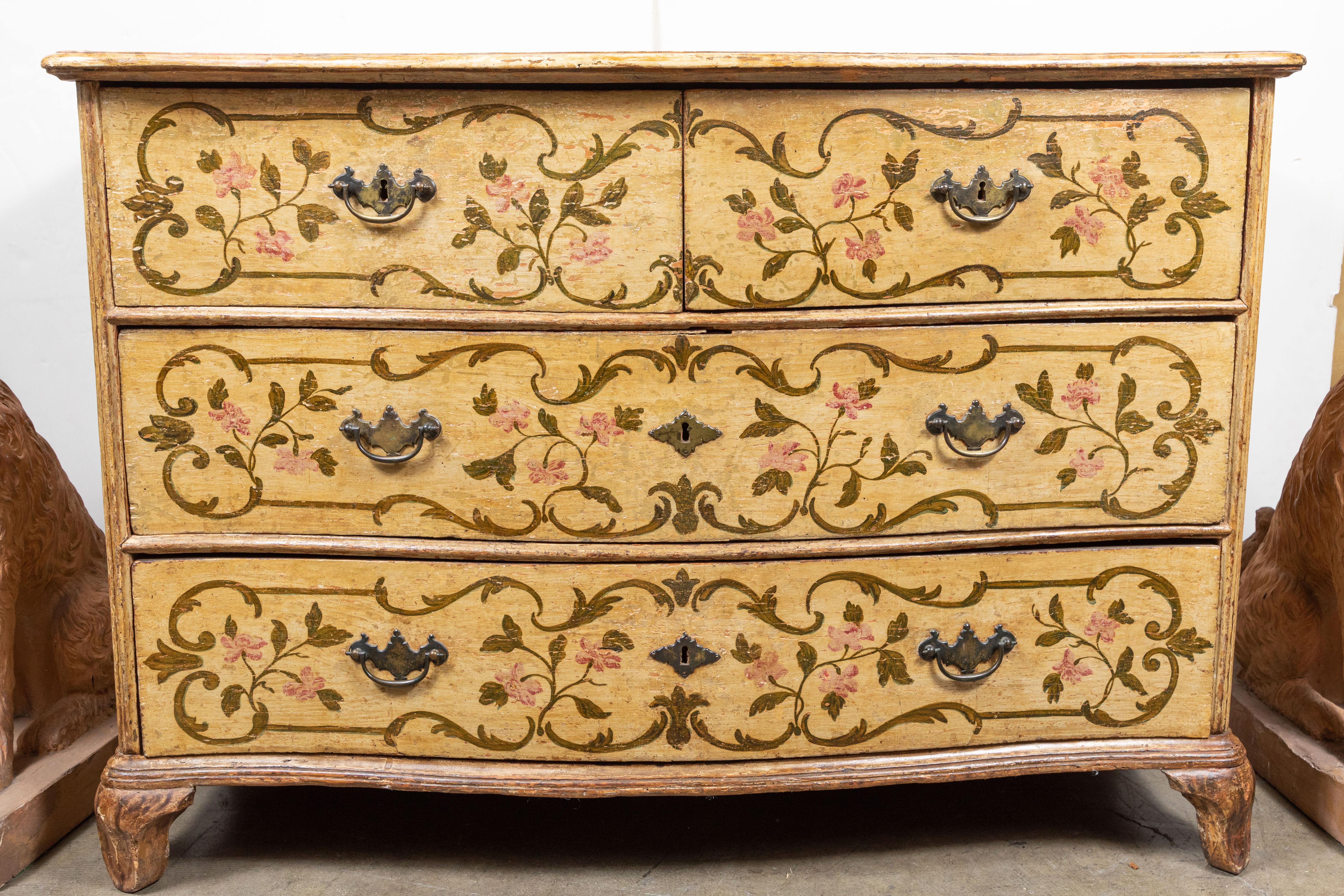 Large, circa 1850, hand carved and painted, Venetian, two-over-two, bow-front commode with faux marble top. The whole featuring lush, foliate forms throughout, and embellished with pink rose blossoms.