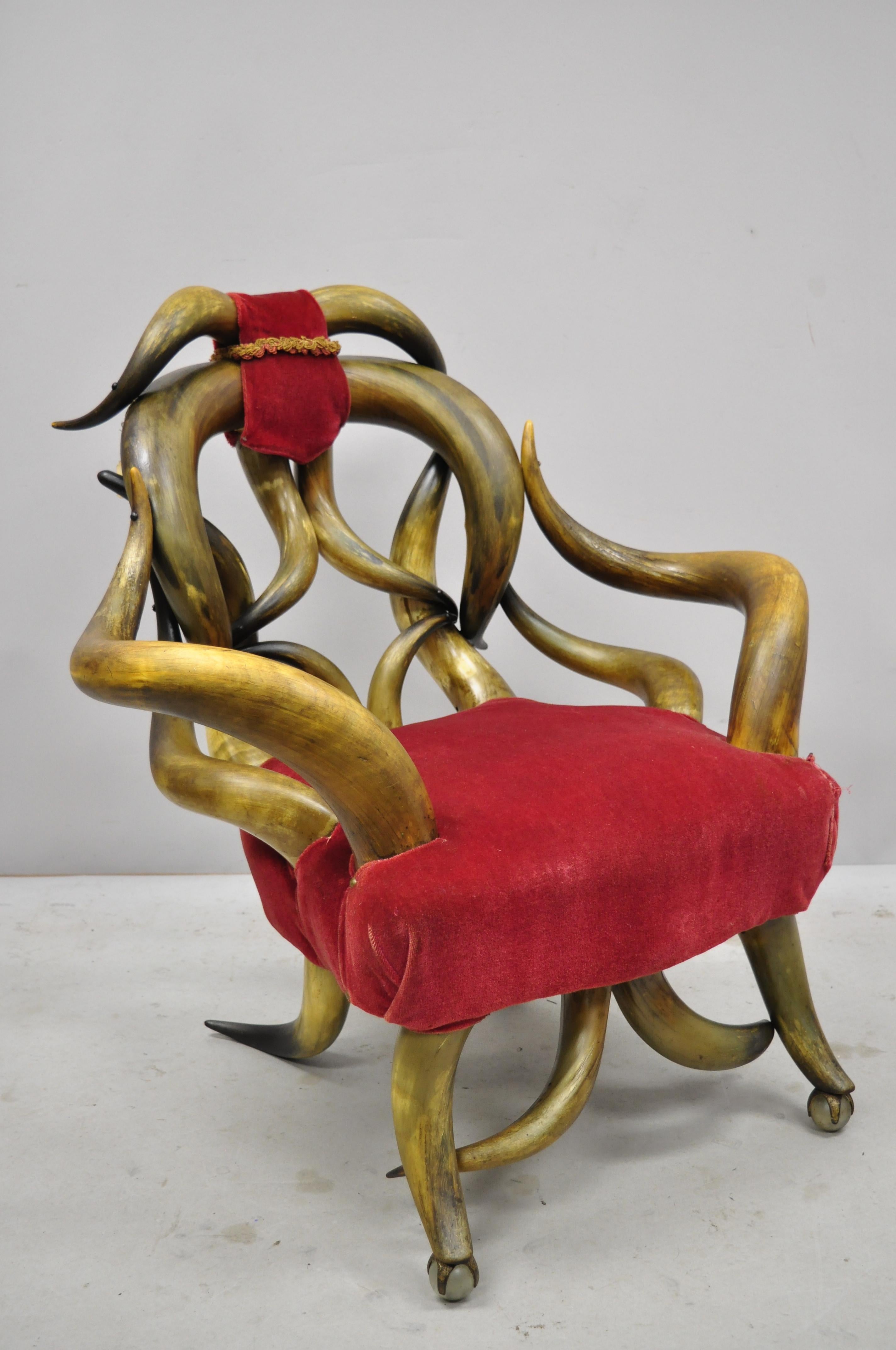 19th century Victorian antique steer horn parlor club lounge chair with glass ball feet. Item includes glass ball feet, mohair fabric, shapely steer horn frame, very nice antique item, great style and form, circa late 19th century. Measurements: