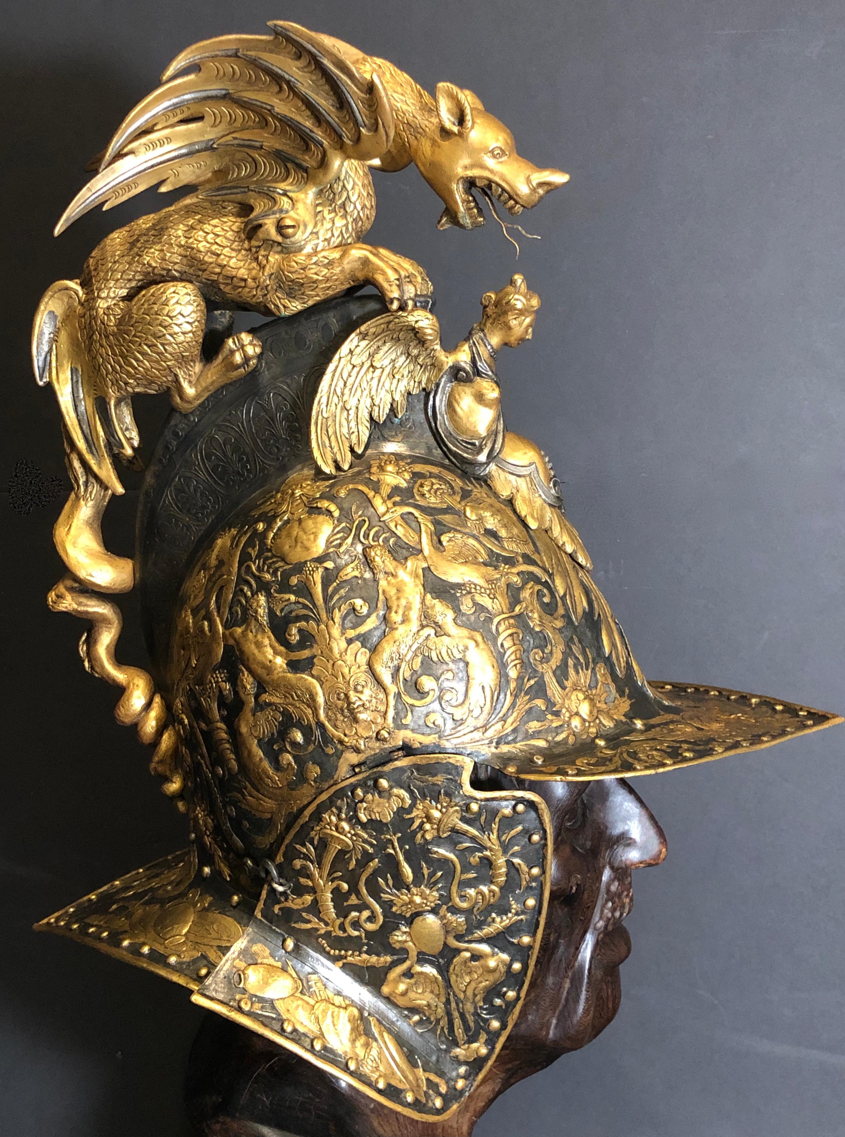 19th century gilt and silvered Victorian museum reproduction of king Henry II of France embossed burgonet helmet. Helmet skull of typical form. The entire helmet is completely embossed with mythological figures from Greek and roman culture, floral