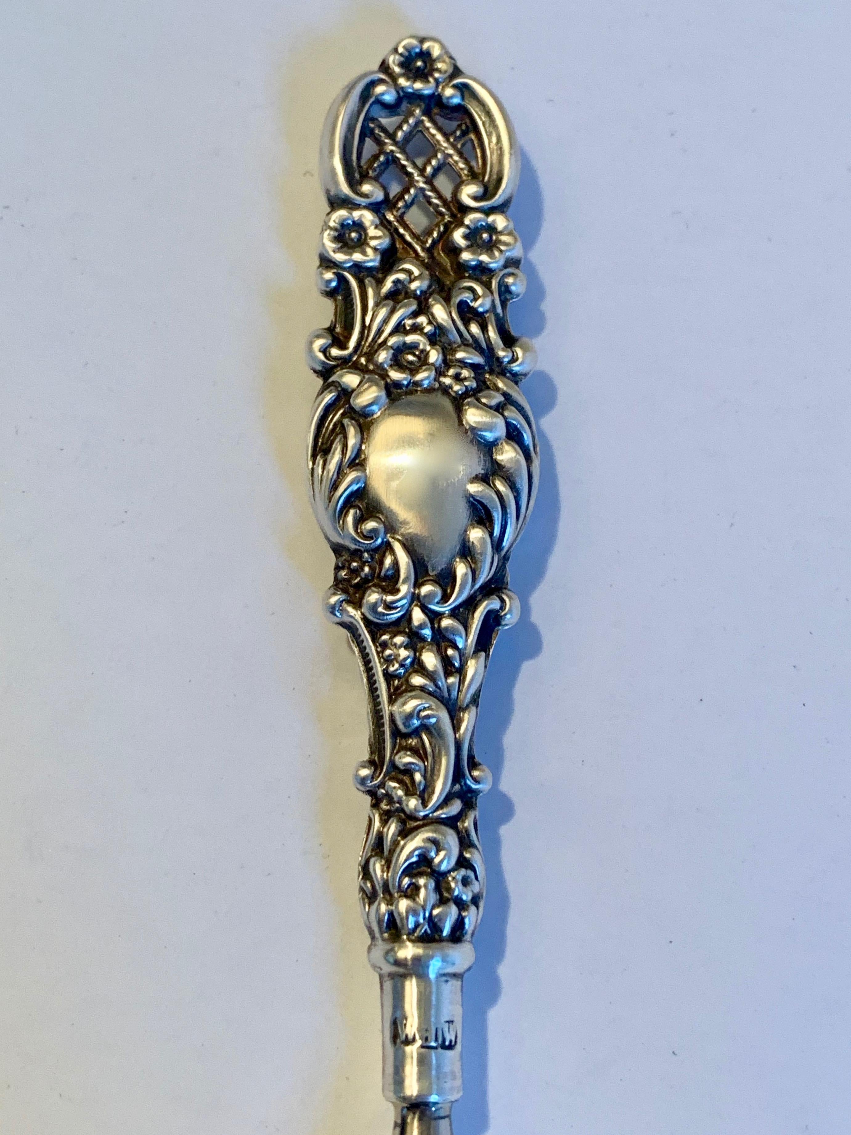 19th century English Repousse with lattice sterling silver shoe horn - perfect for the dressing table or dressing room.... a wonderful practical or decorative piece. In very good condition.