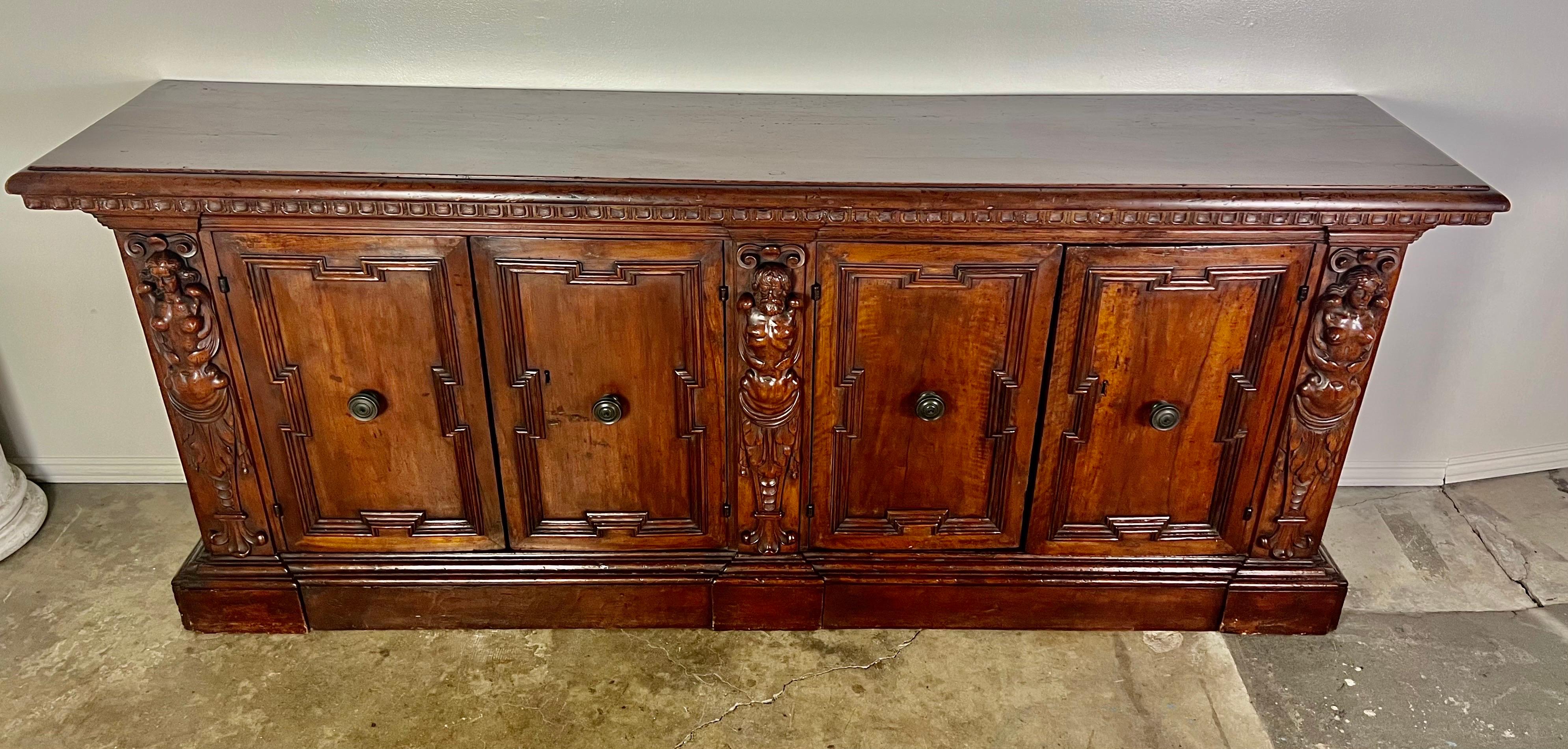 Renaissance 19th Century Walnut Italian Credenza with Intricate Carving Throughout For Sale