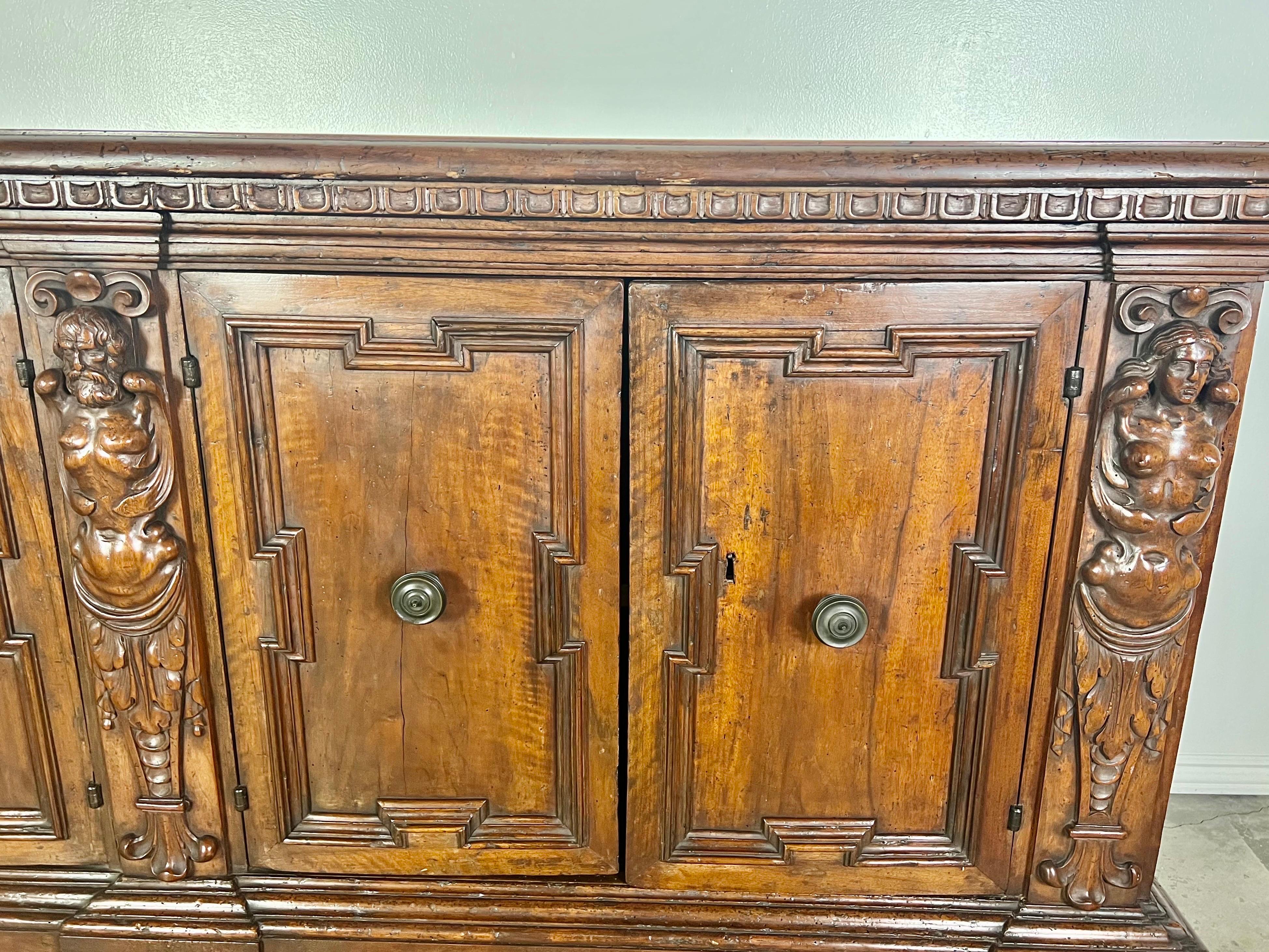 Hand-Carved 19th Century Walnut Italian Credenza with Intricate Carving Throughout For Sale