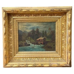 19ème siècle. Huile sur toile d'un paysage américain encadrée d'eau dorée représentant un moulin sur une rivière
