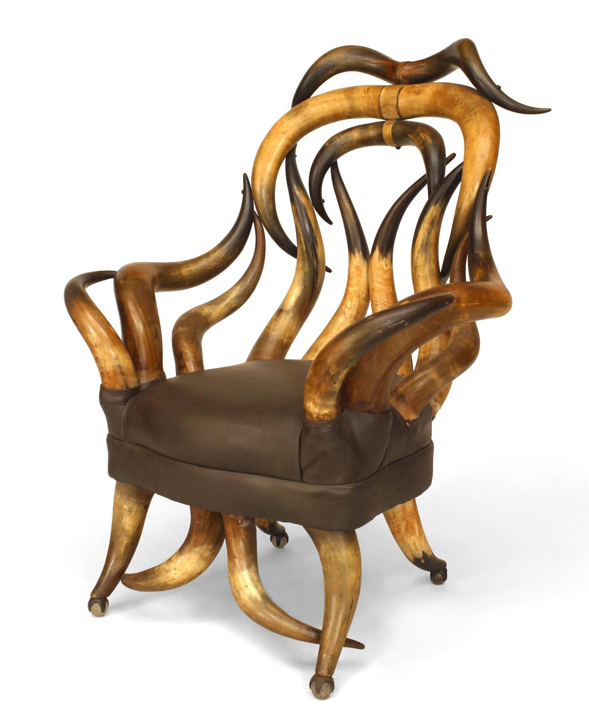 American Rustic (last quarter 19th Cent) steer horn arm chair with high back and dark brown upholstered seat. (by Charles Puppe, San Antonio, TX)
