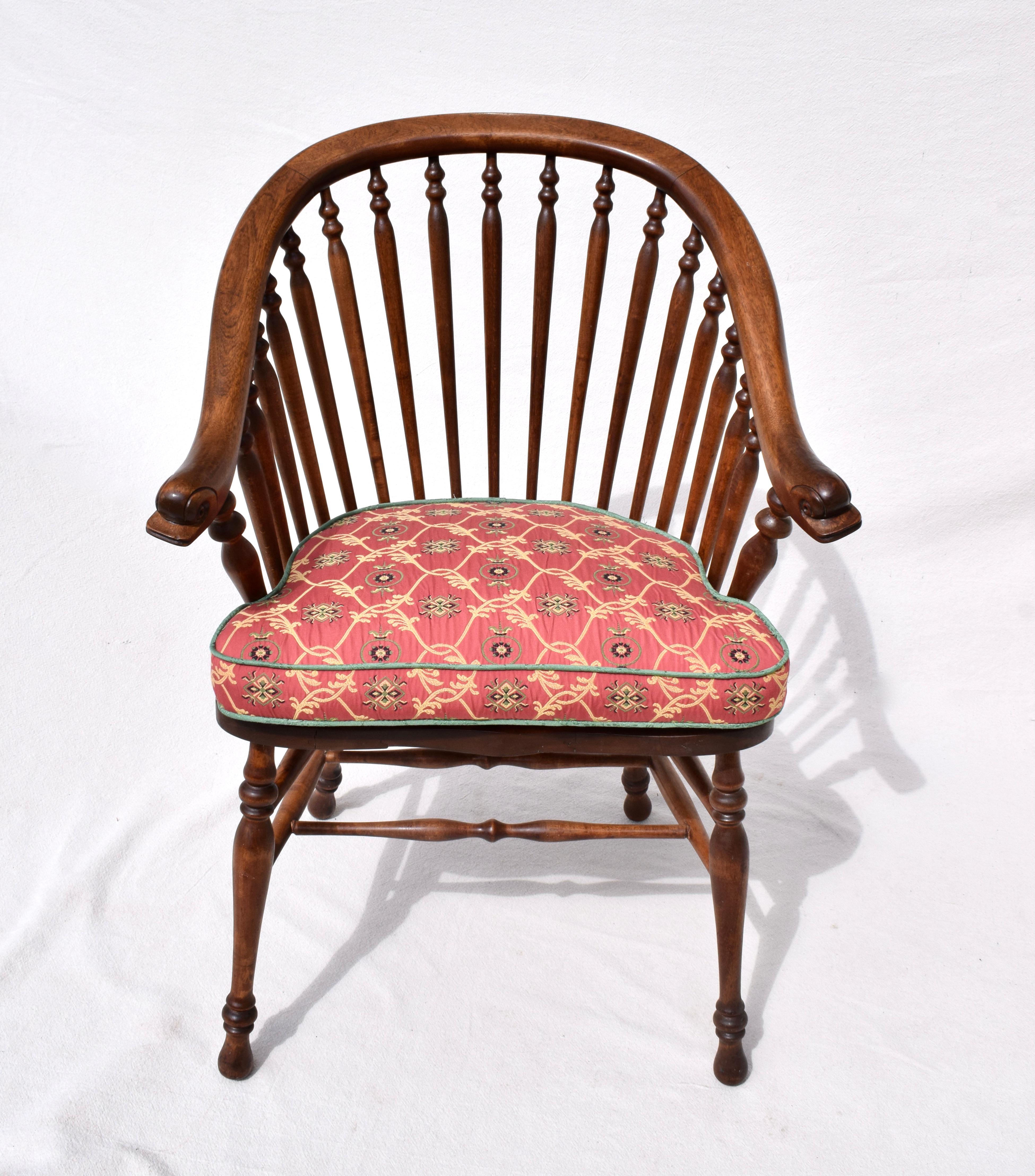 A scarcely seen 19th c. spindle back barrel chair with George Hunzinger & Windsor chair influences. Marvelous character in the unusual splayed & carved dolphin heads arms, bent surround, turned spindles, stretchers & legs with mortise & tenon