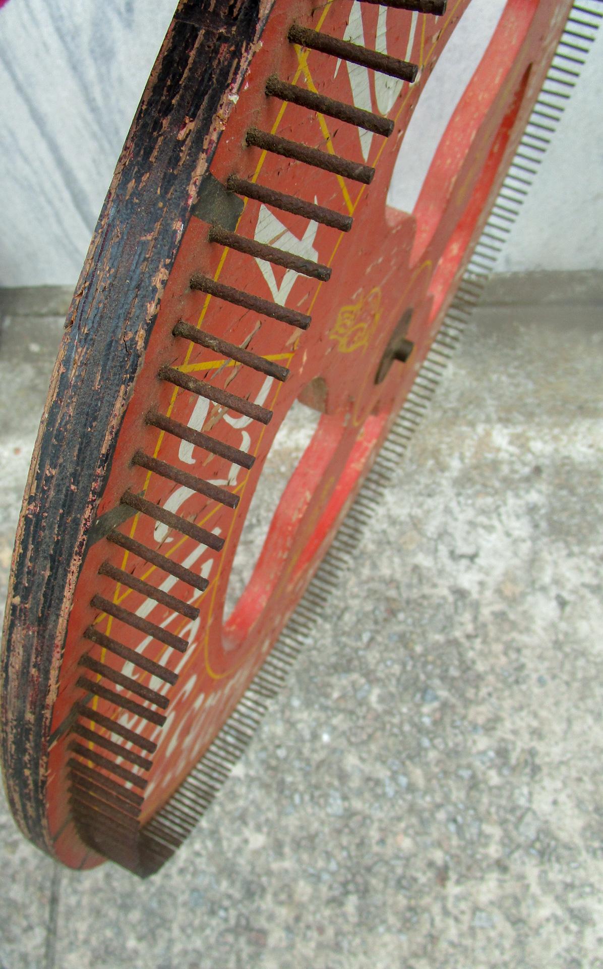19thc Wooden Folk Art Gaming Wheel with Original Red Paint & Cardinal Design In Good Condition For Sale In Savannah, GA