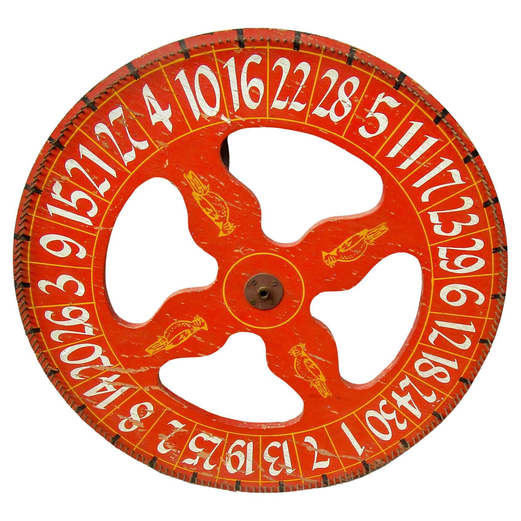 19th C Wooden Folk Art Gaming Wheel with Original Red Paint & Cardinal Design
