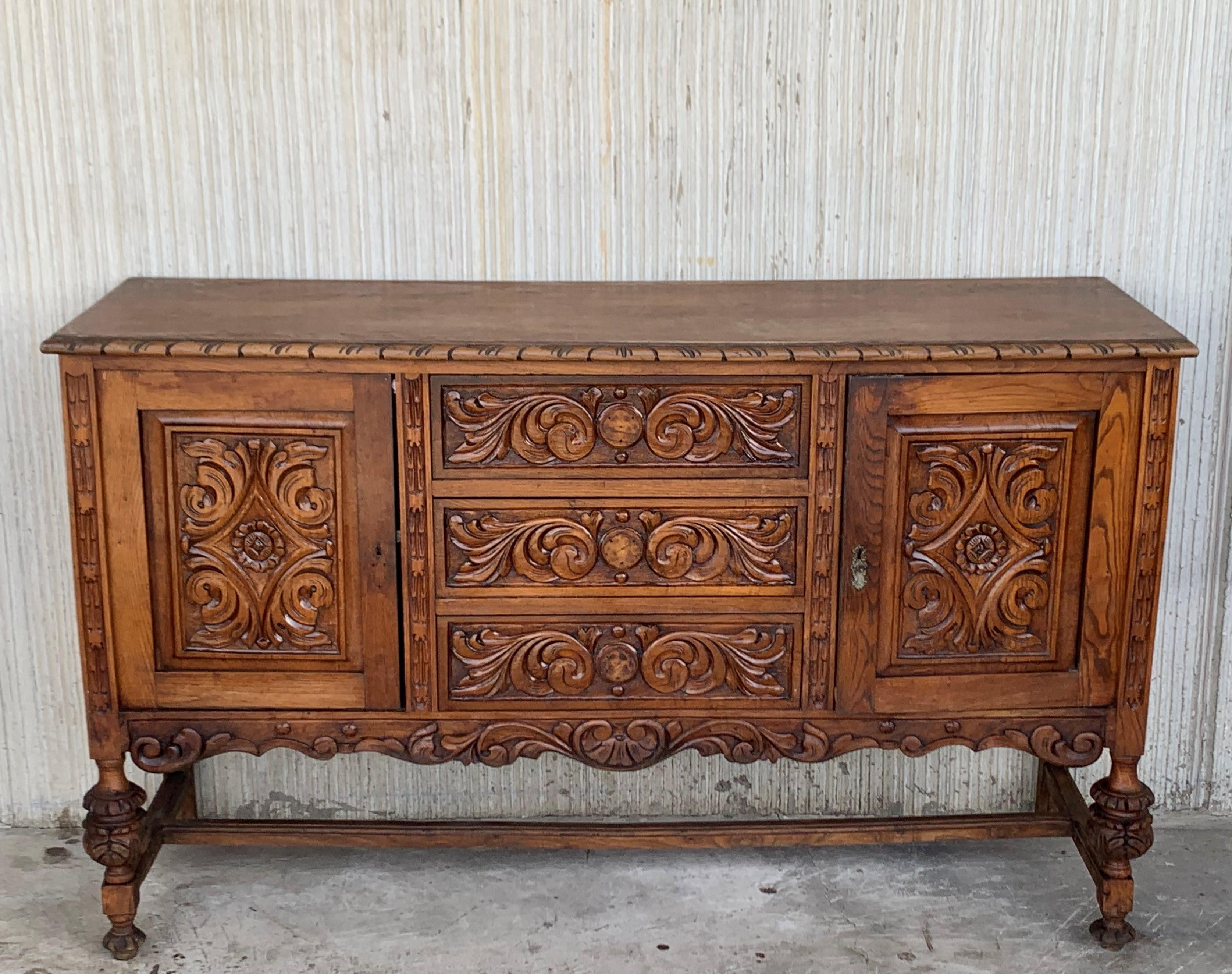 19th century Catalan Spanish buffet with two carved drawers and two doors.