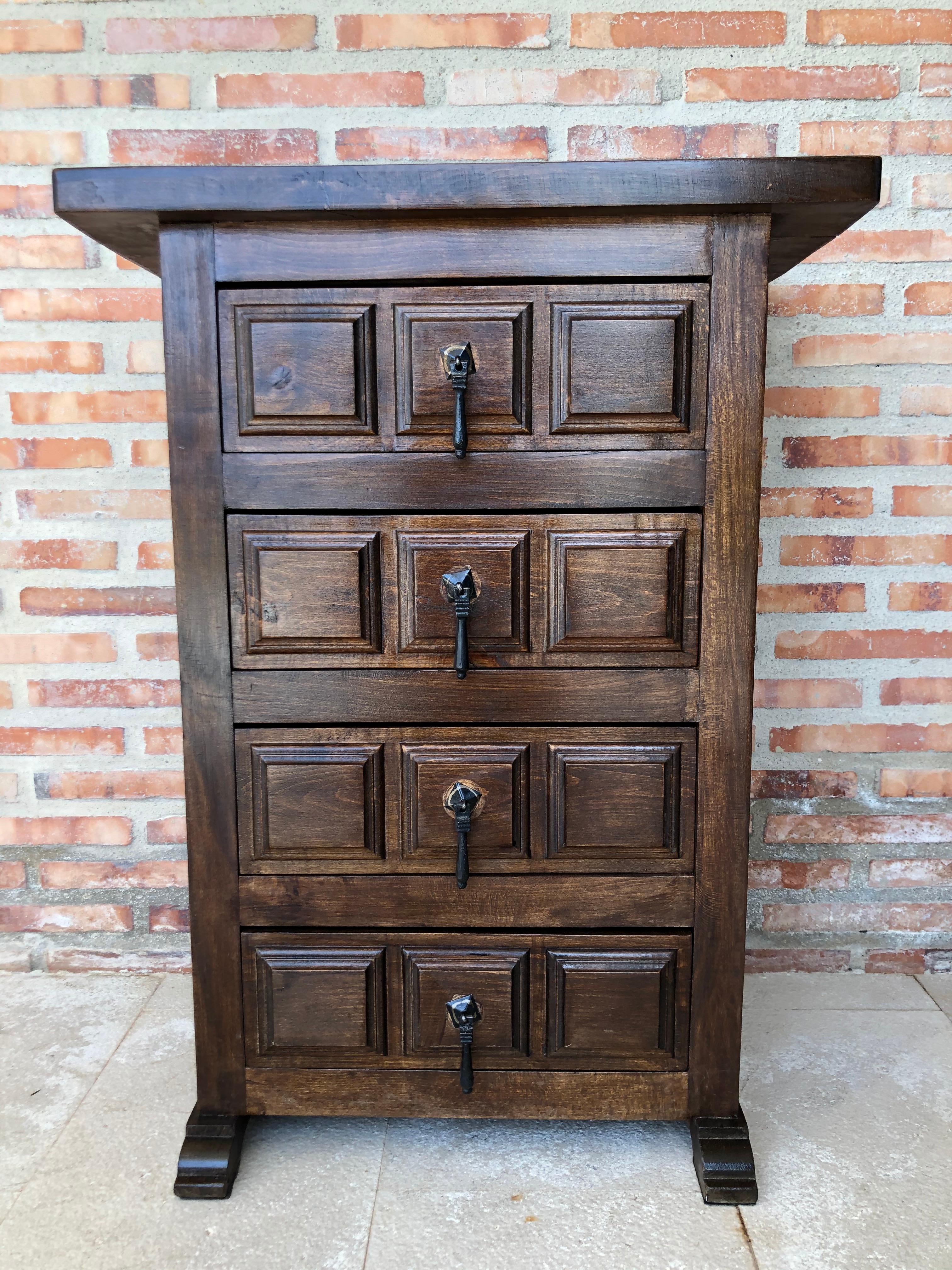 19th century Catalan Spanish carved walnut chest of drawers, highboy or console
Country Provincial Chiffoniere was fashioned from solid walnut and features four drawers carved with charming detail and fitted with unusually intricate cast brass