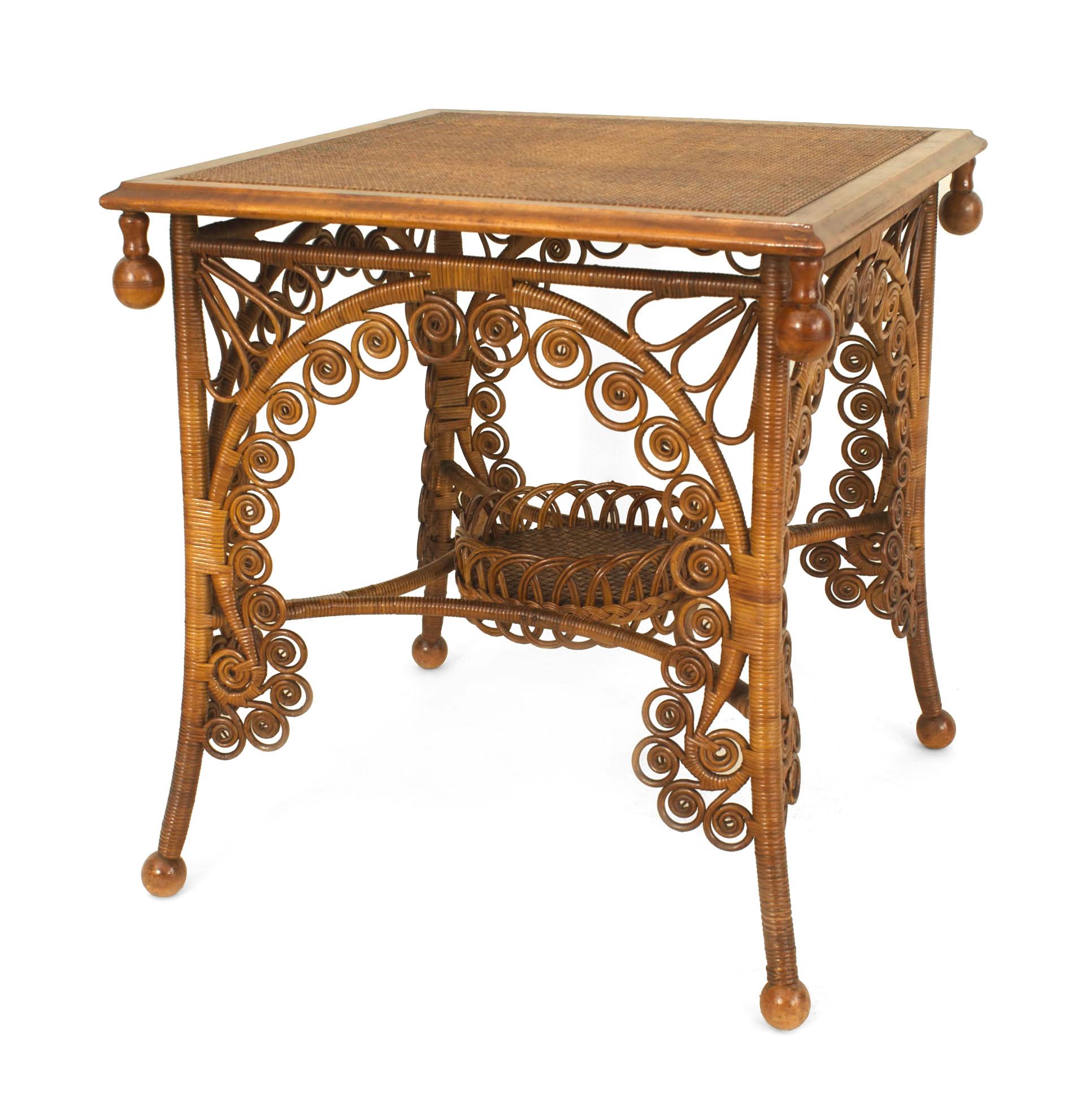 American Victorian natural wicker large square end table with a woven top resting on a four-legged base with multiple scroll design and a round stretcher shelf (Heywood Bros label).


Heywood Brothers was established in 1826, Wakefield Company in