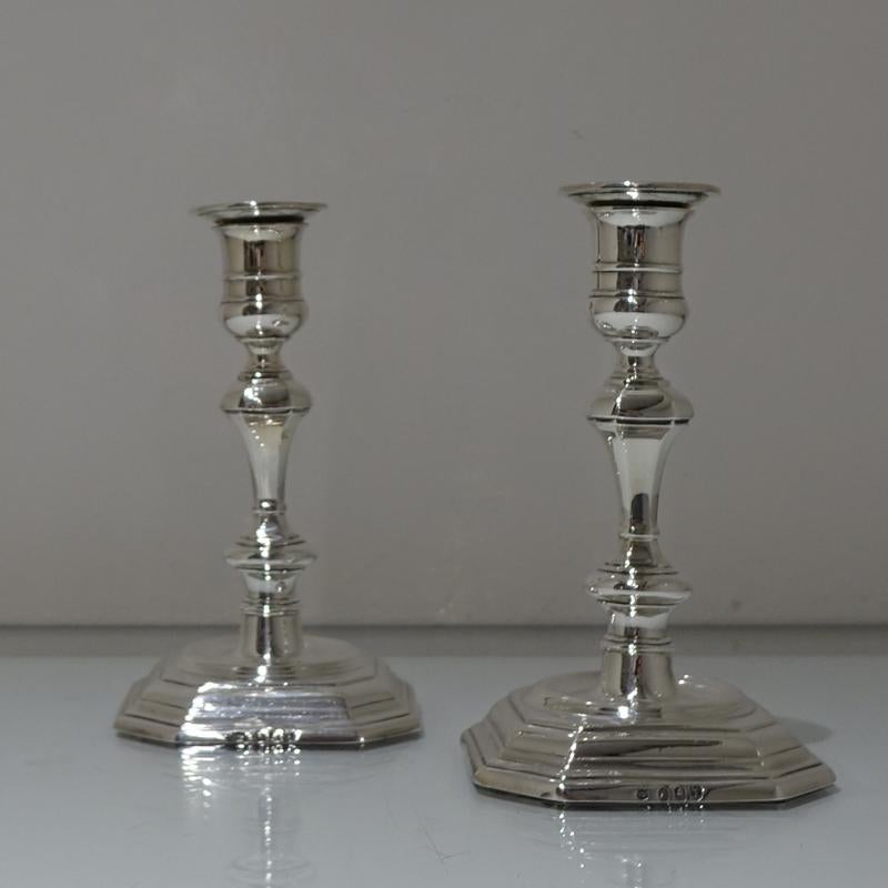 A stylish pair of late 19th century plain formed Britannia standard silver cast candlesticks designed with square cut cornered bases and sunken in wells. The nozzles are detachable.

 

Weight: 18.26 troy ounces/568 grams

