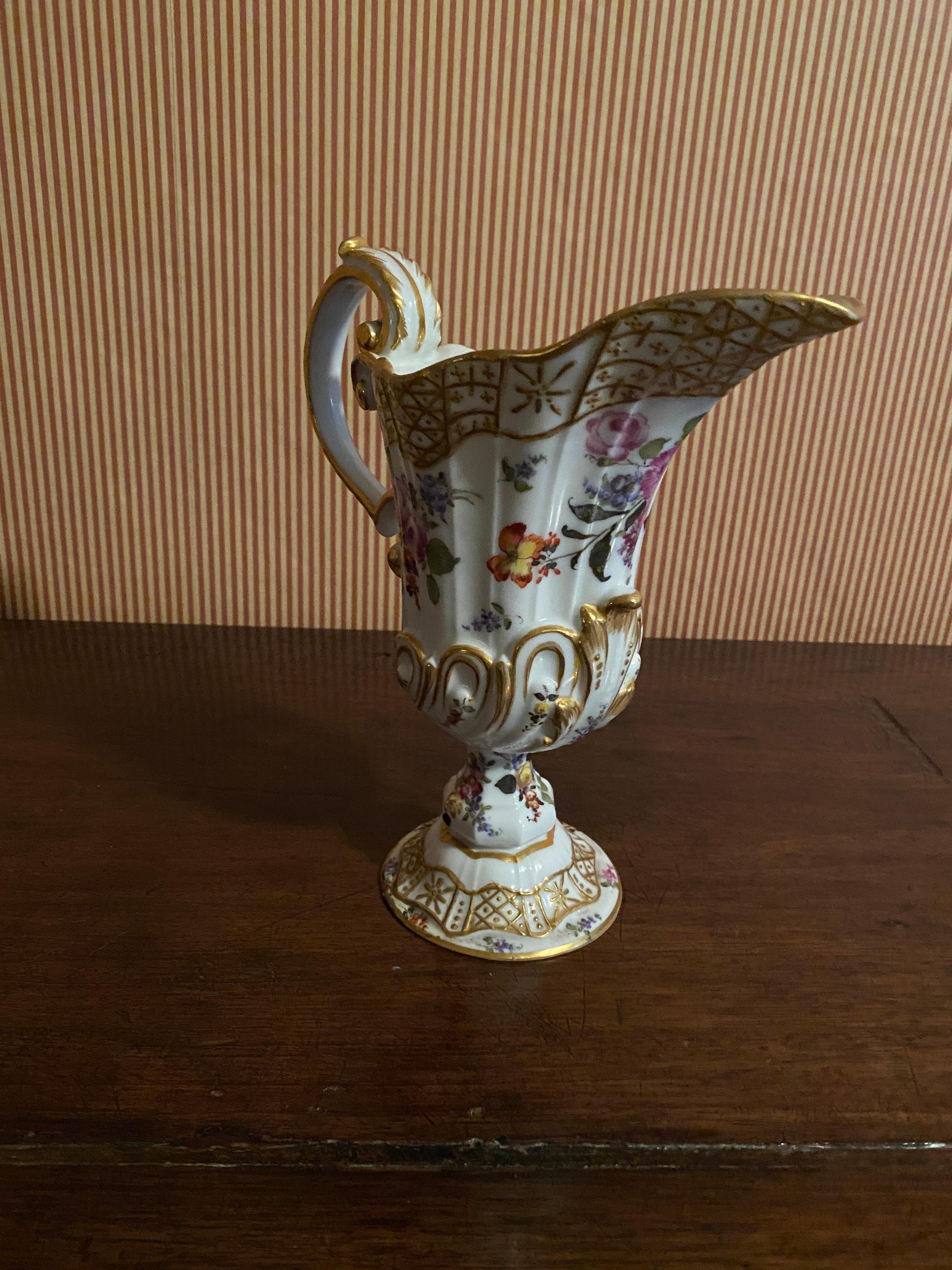 A very interesting Ewer in the manner of Meissen, decorated with 