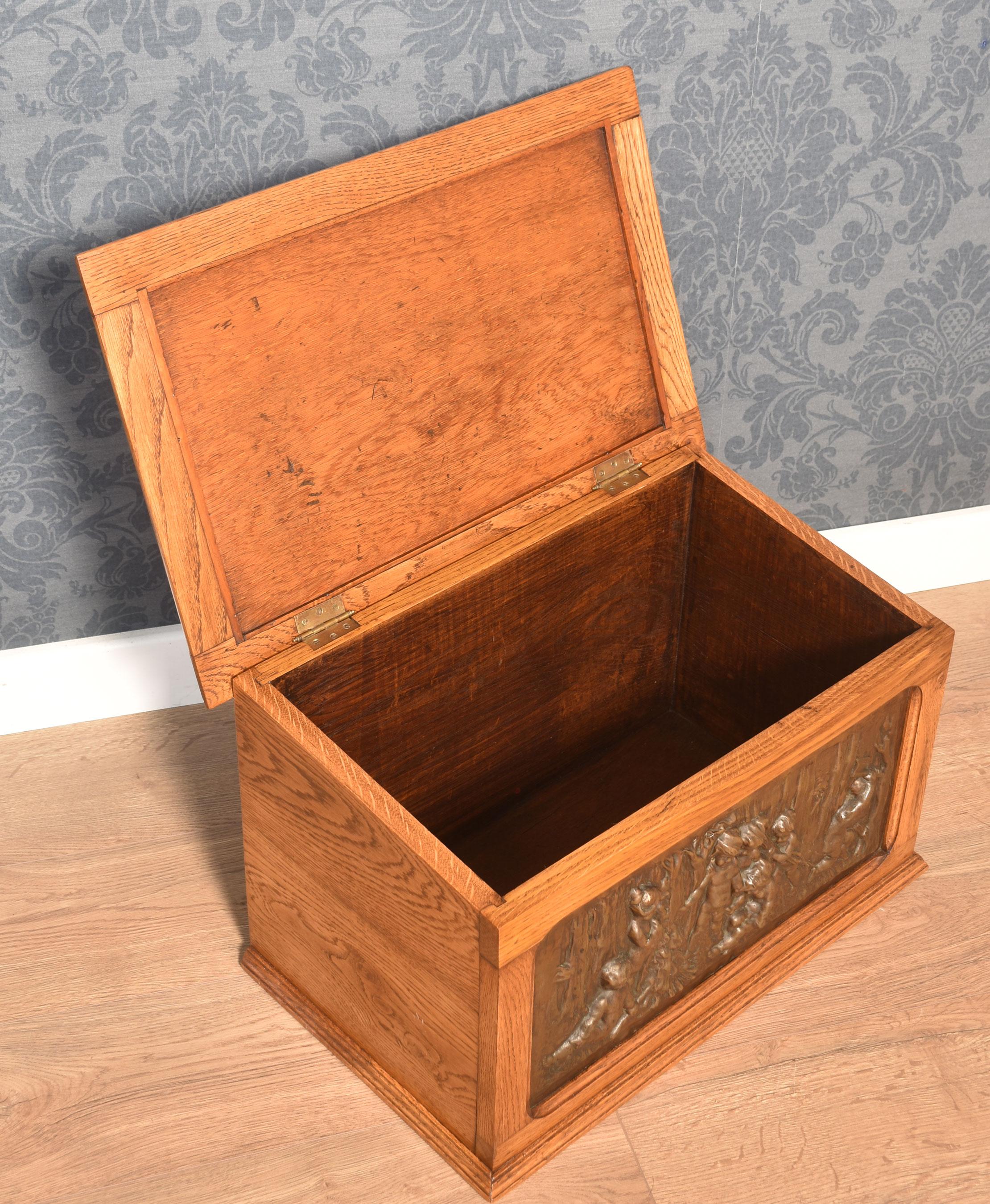 Oak 19th Centry embosed copper slipper box For Sale