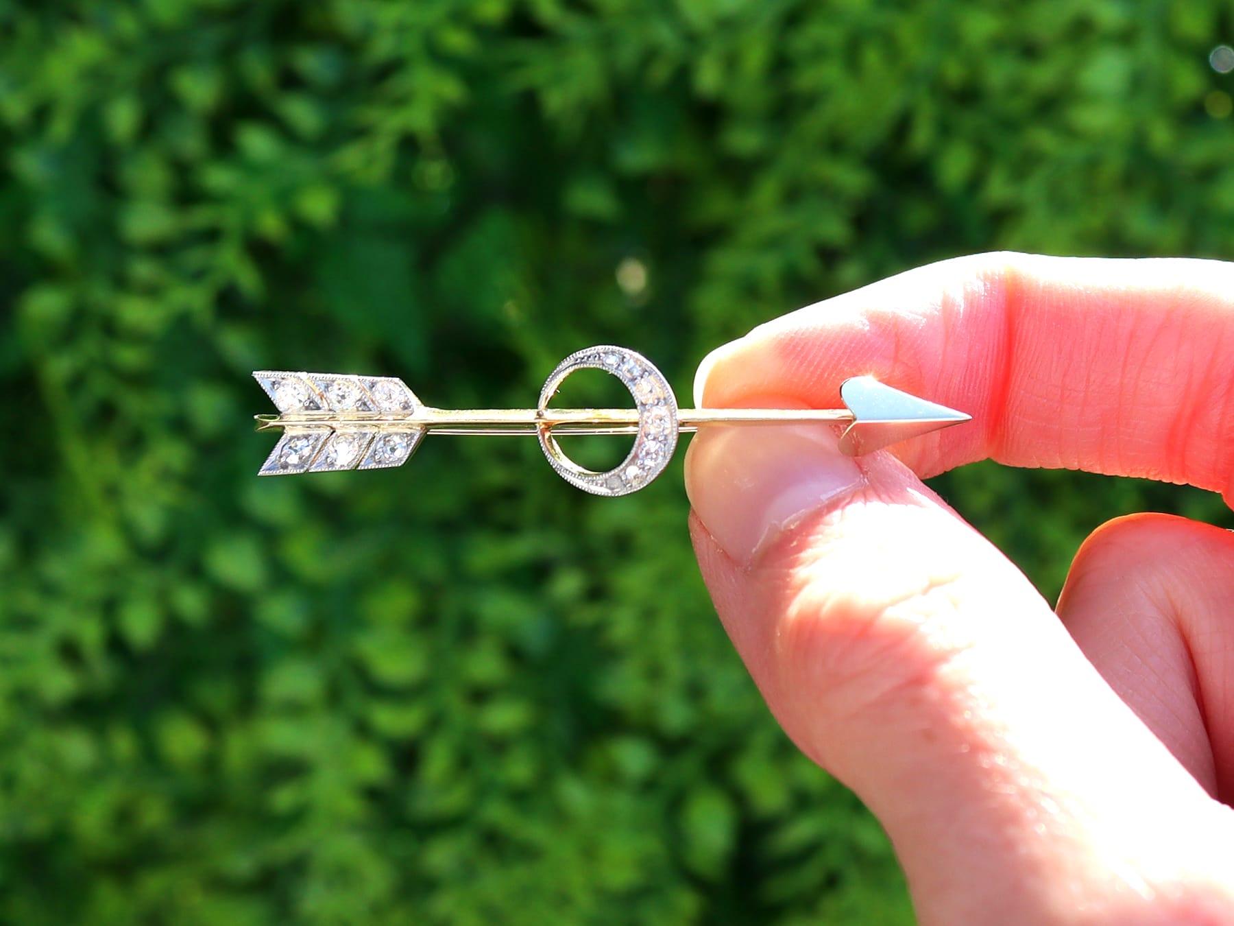 A fine and impressive 0.29 carat diamond, 15 karat yellow gold and platinum set brooch; part of our diverse antique diamond brooches and estate jewelry collections

This fine and impressive antique Victorian brooch has been crafted in 15k yellow
