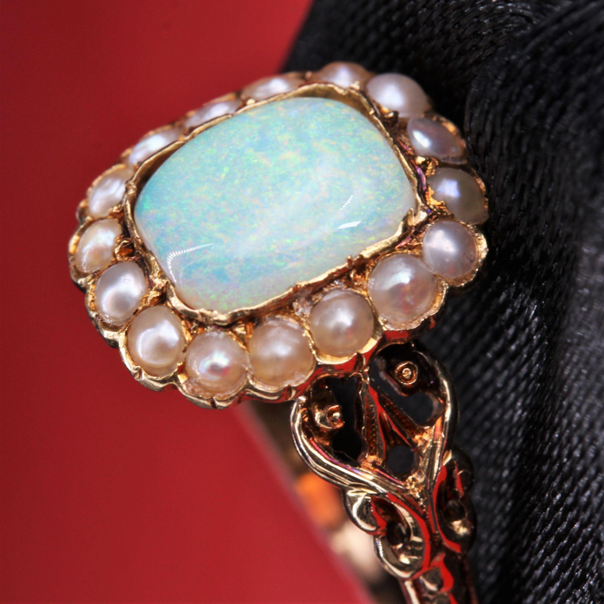Women's 19th Century 0.79 Carat Opal Natural Pearls 18 Karat Yellow Gold Ring For Sale
