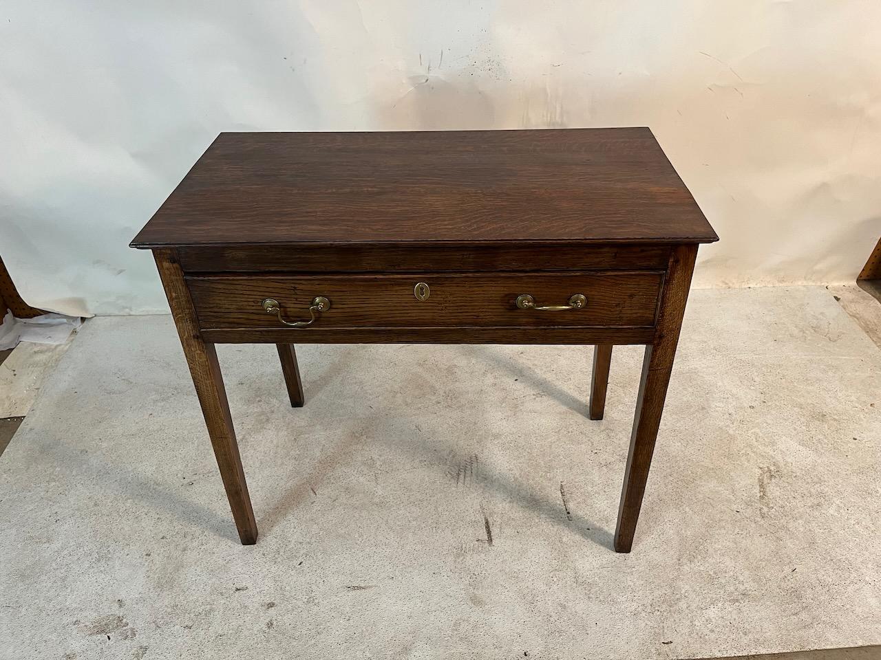 Early 19th century one drawer side table with original brasses.  Simple lines.
