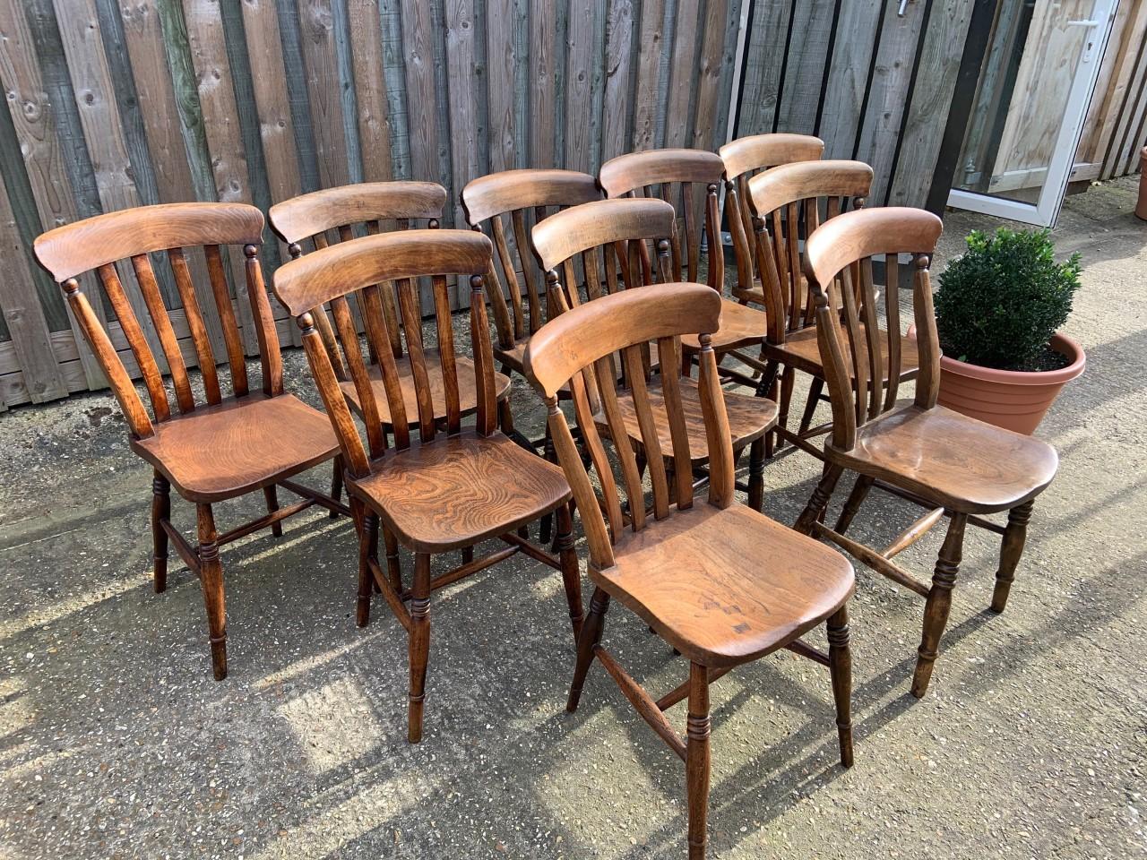 Ten 19th century lath back dining chairs, with superb color and patination. Fully restored and all very sturdy comfortable chairs.