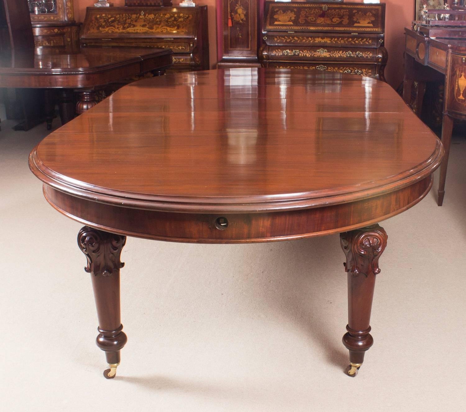 English 19th Century Victorian Oval Extending Dining Table and Ten Chairs