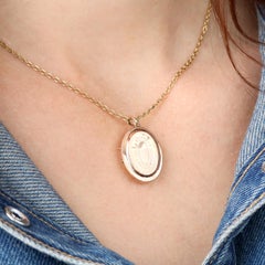 19th Century 18 Karat Rose Gold Chiselled Locket Oval Pendant
