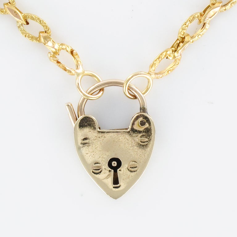 19th Century 18 Karat Yellow Gold Chiseled Chain HeartShaped Padlock